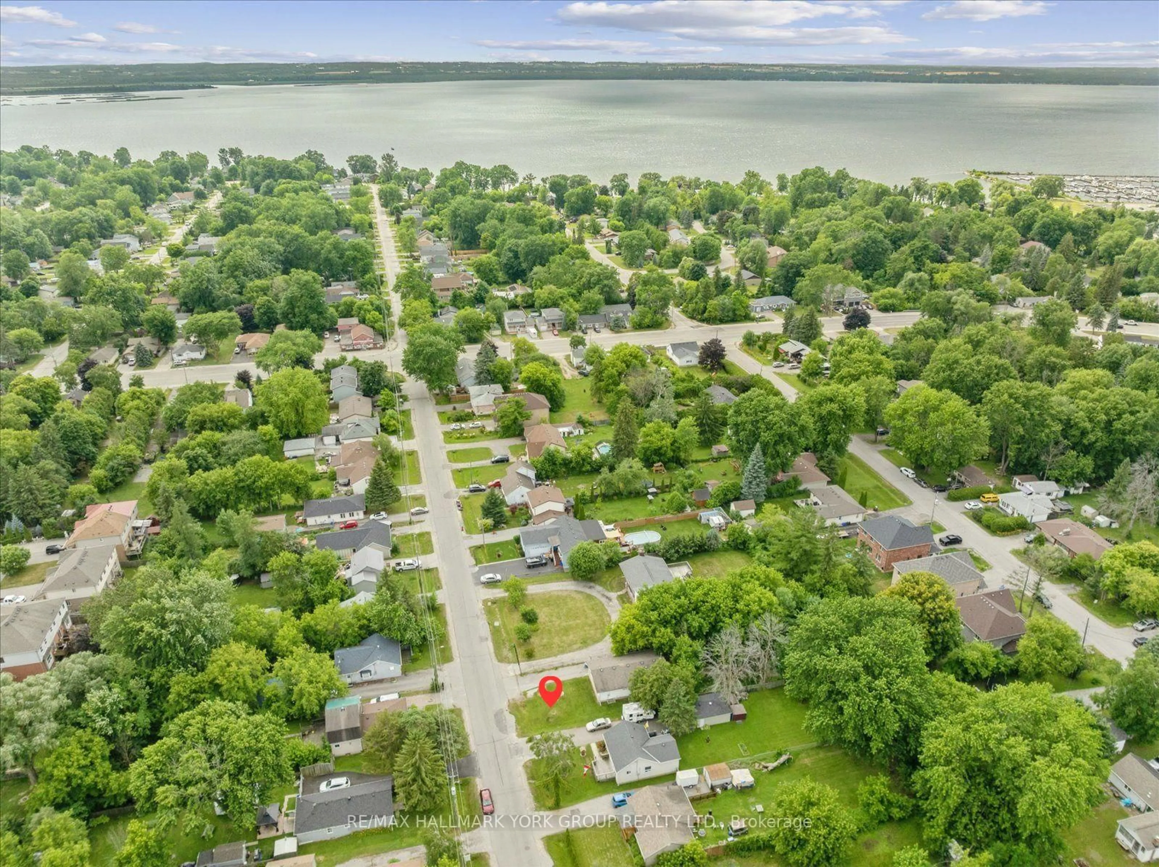 A pic from outside/outdoor area/front of a property/back of a property/a pic from drone, water/lake/river/ocean view for 162 Bayview Ave, Georgina Ontario L4P 2S9