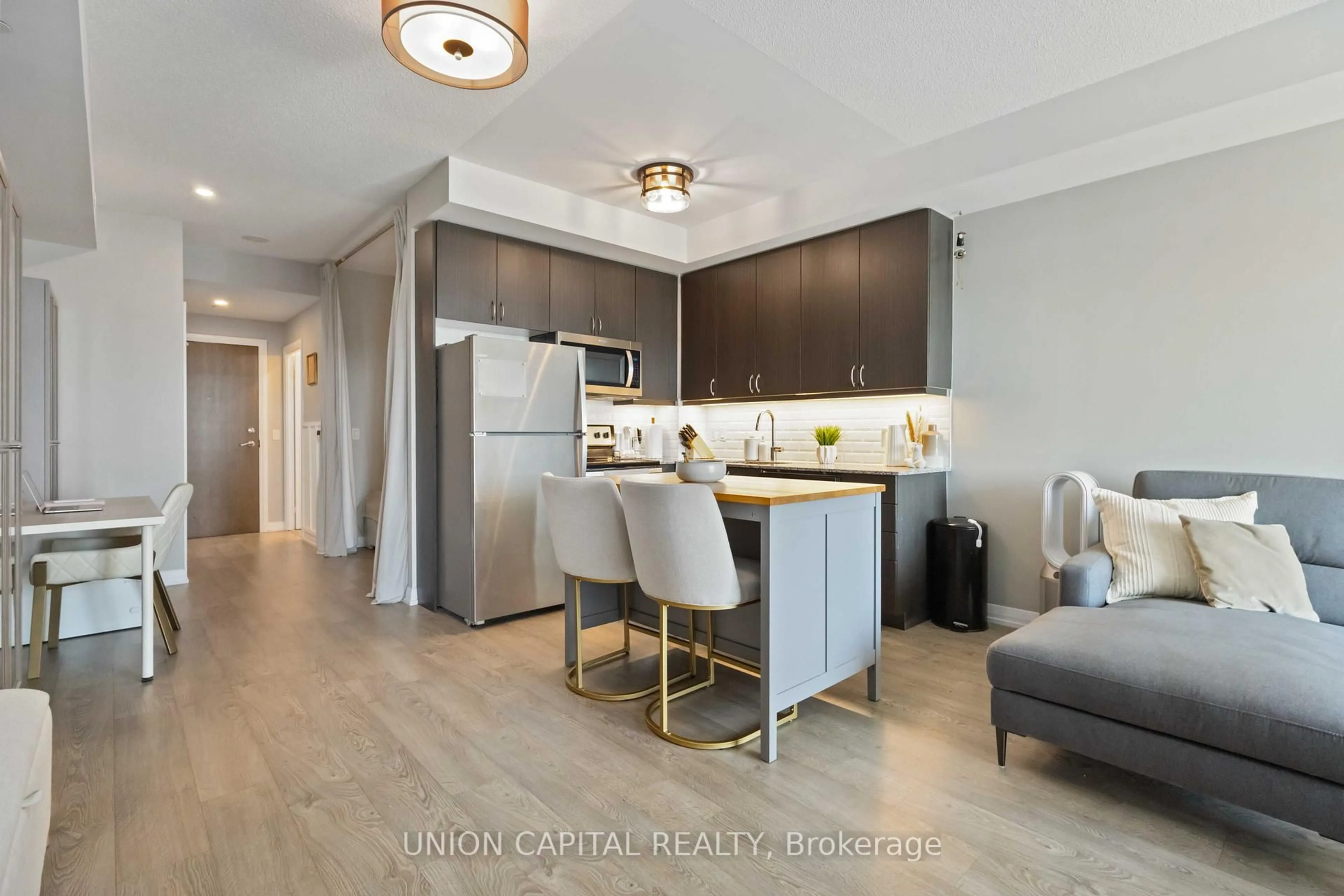 Open concept kitchen, wood/laminate floor for 9560 Markham Rd #512, Markham Ontario L6E 0T9