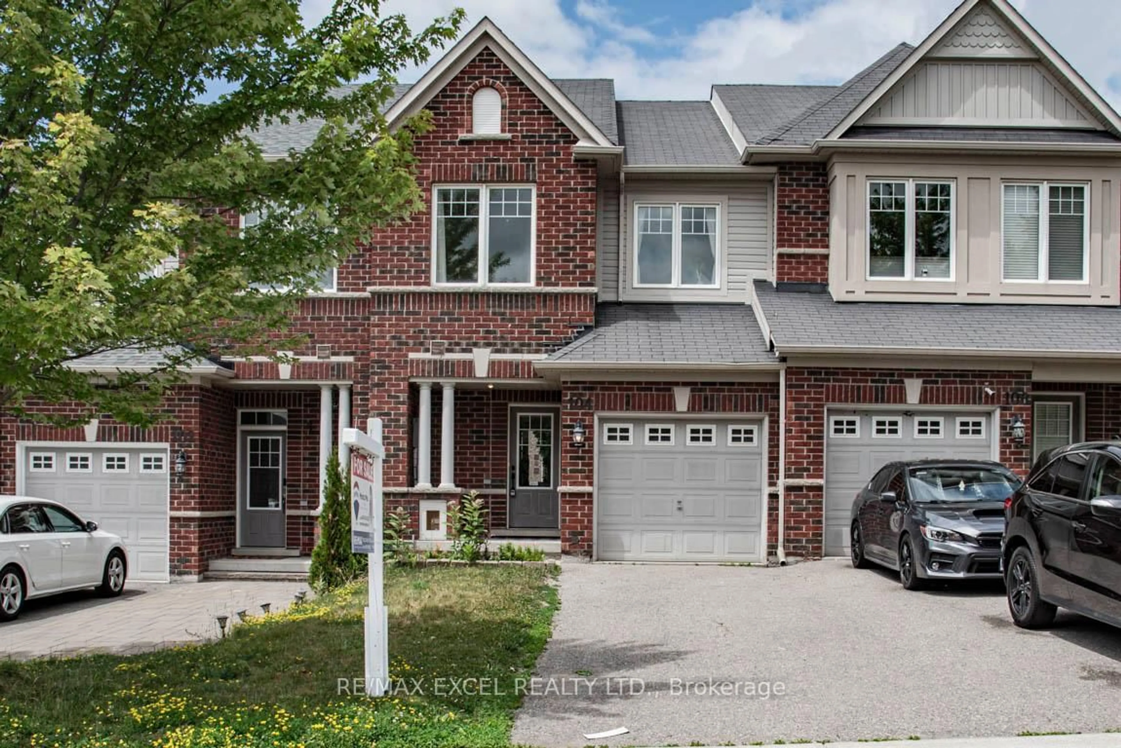 Home with brick exterior material, street for 104 Harvest Hills Blvd, East Gwillimbury Ontario L9N 0B3