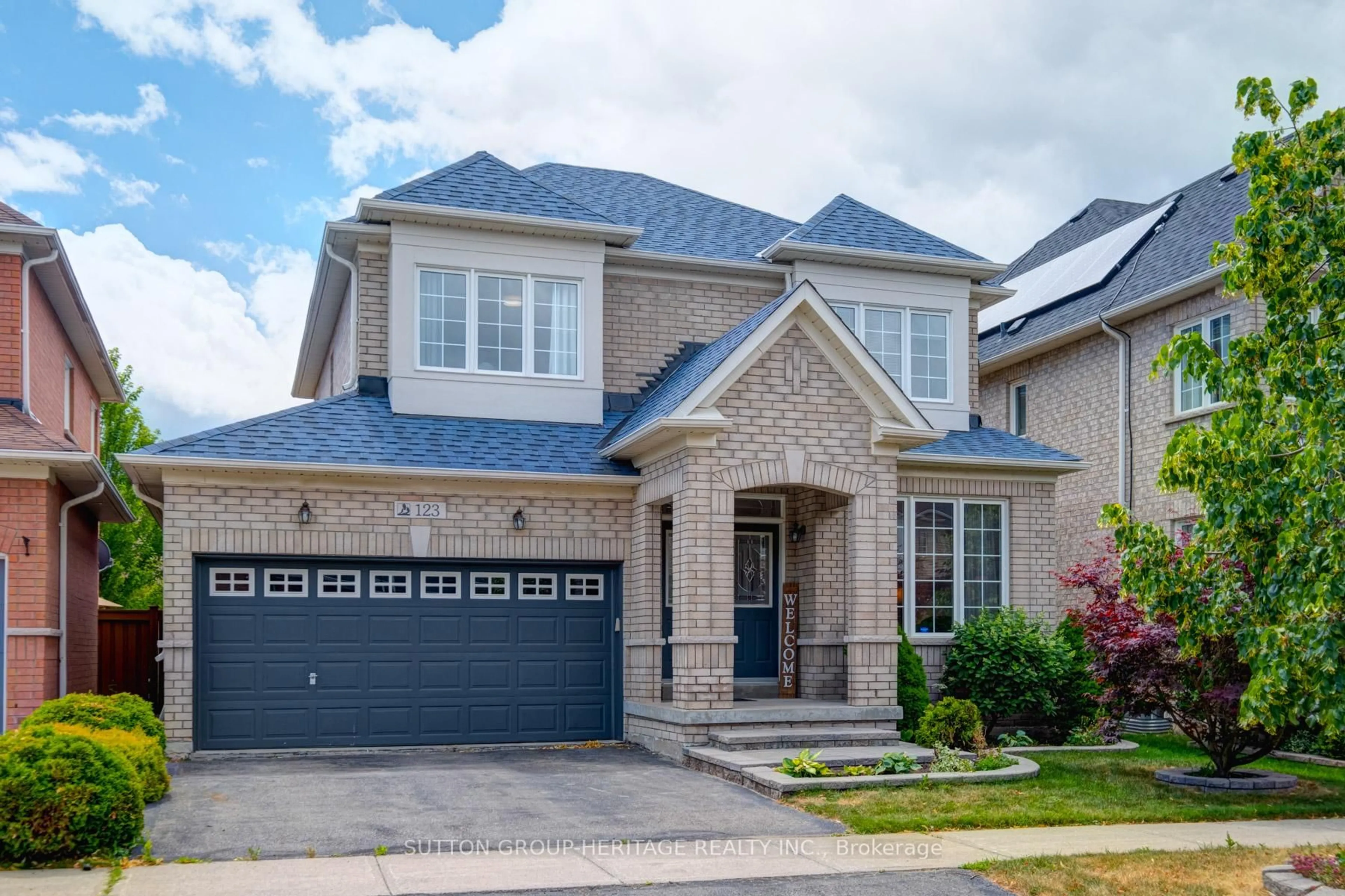 Home with brick exterior material, street for 123 Oakborough Dr, Markham Ontario L6B 0G3