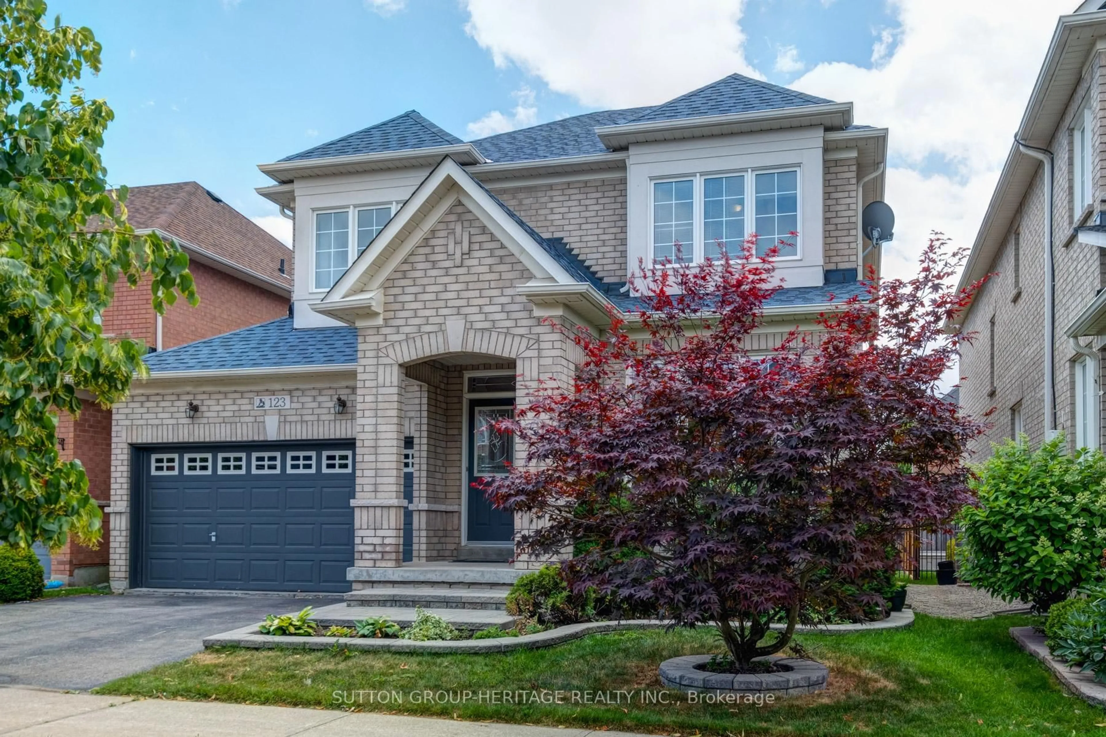 Home with brick exterior material, street for 123 Oakborough Dr, Markham Ontario L6B 0G3