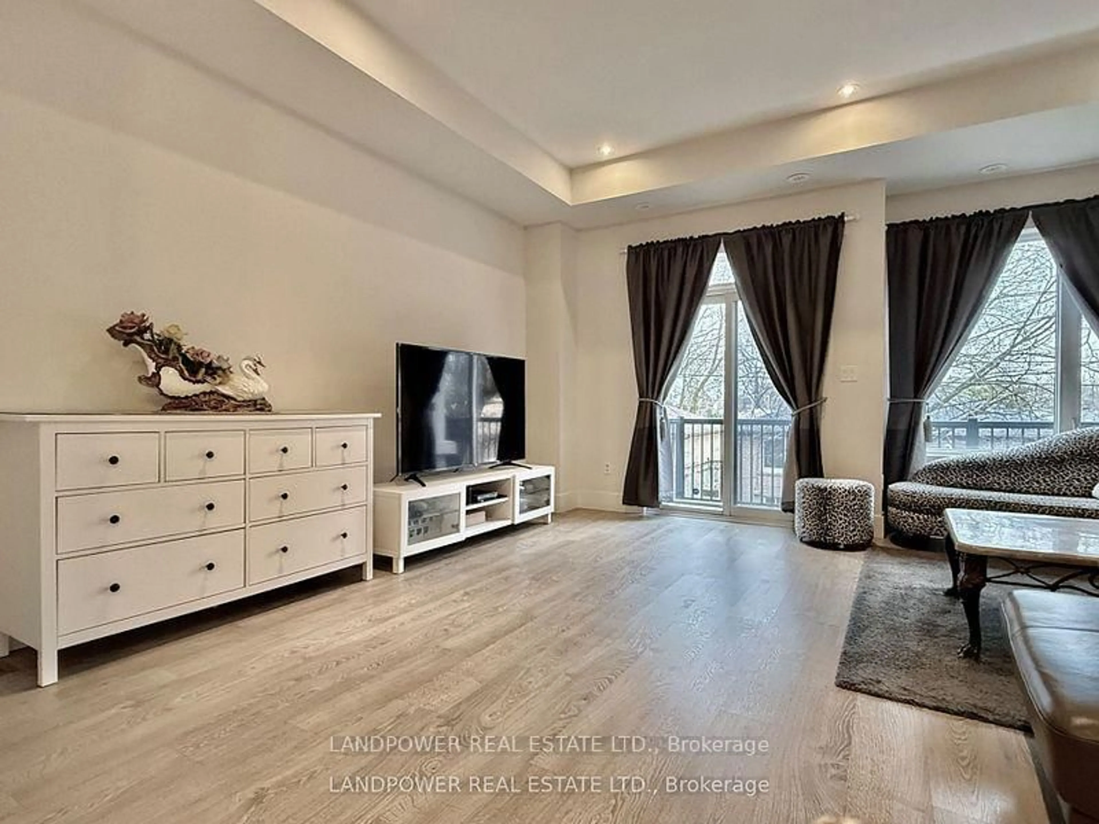 Living room with furniture, wood/laminate floor for 49 Ambler Lane, Richmond Hill Ontario L4C 0Z8