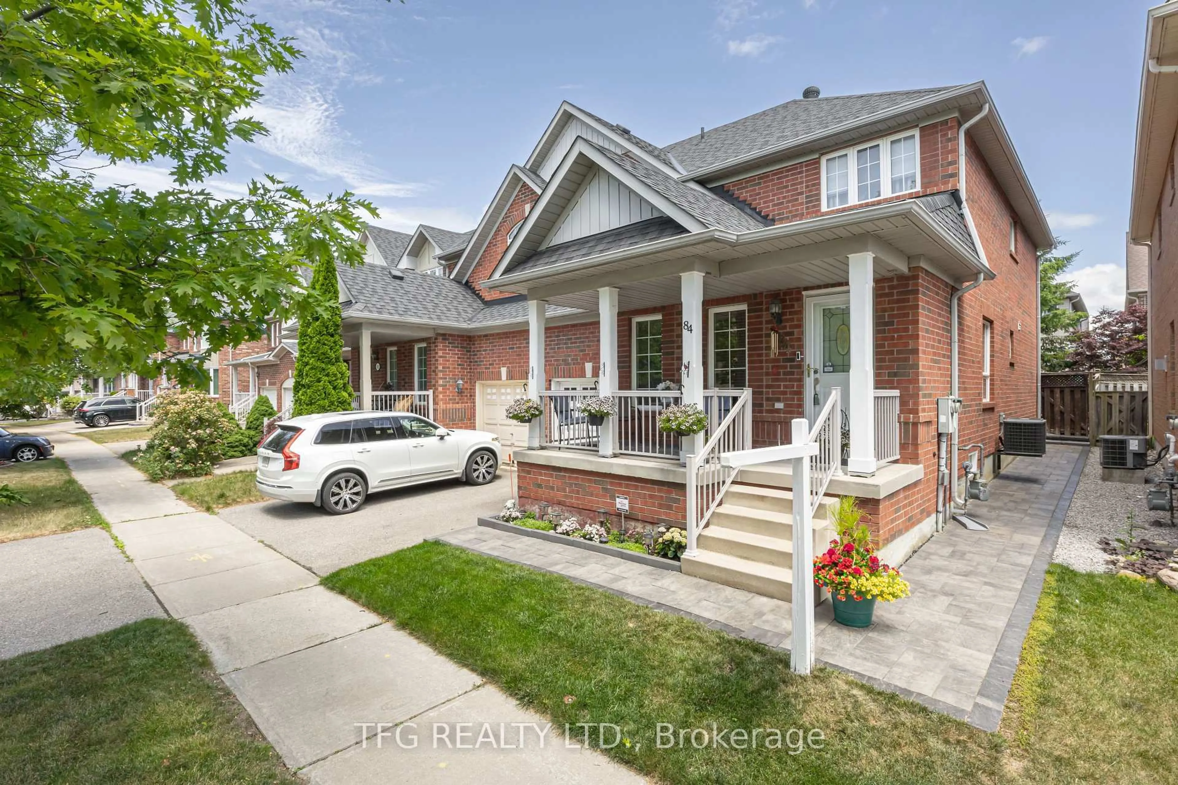 Home with brick exterior material, street for 84 Stotts Cres, Markham Ontario L6E 1T2