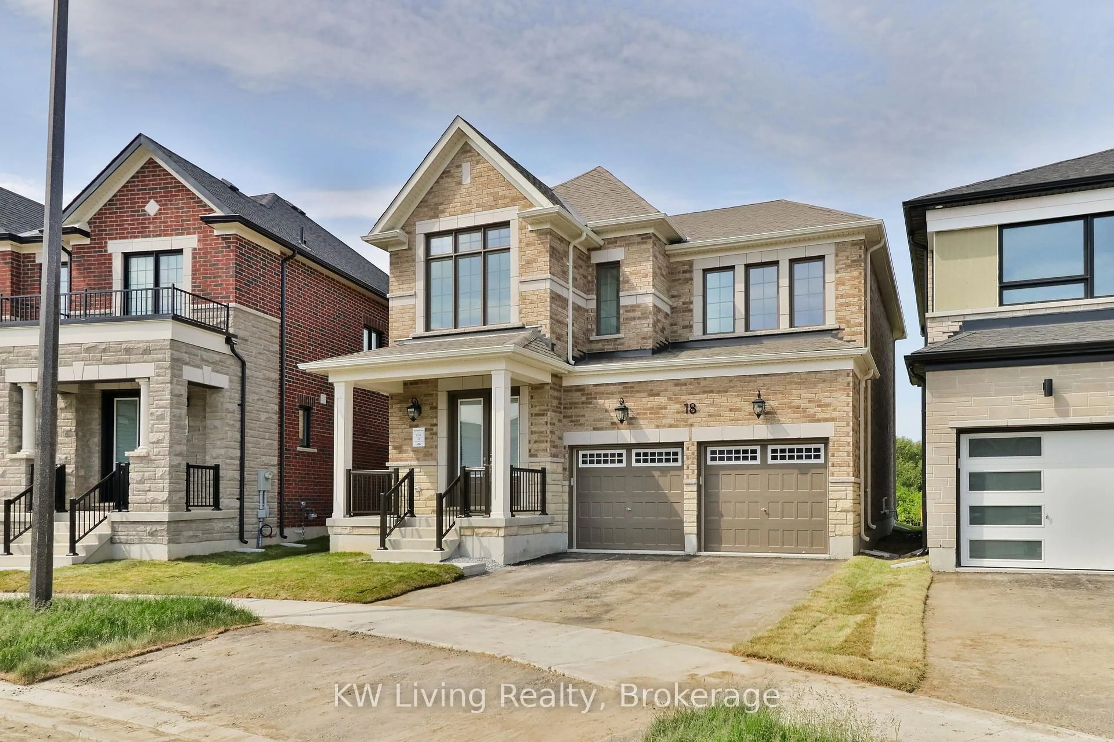 Home with brick exterior material, street for 18 Berczy Manor Cres, Markham Ontario L6C 3M2