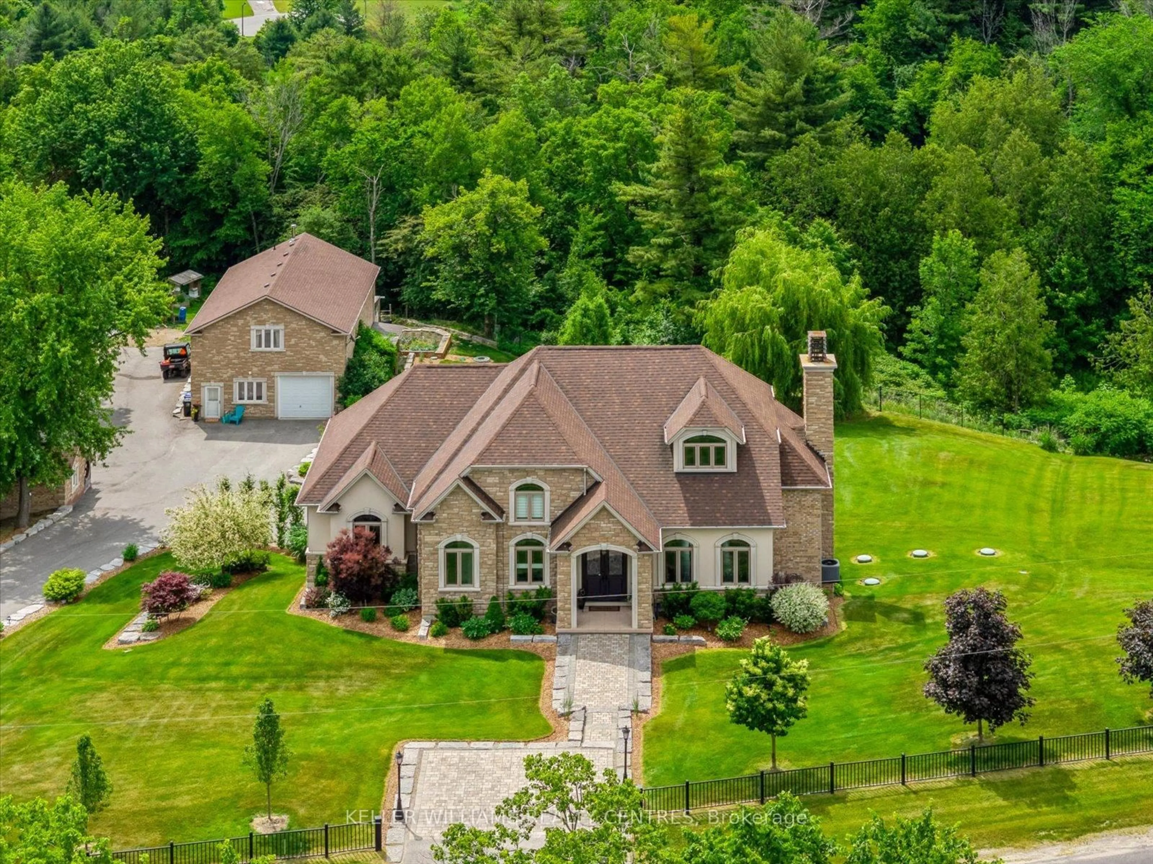 A pic from outside/outdoor area/front of a property/back of a property/a pic from drone, mountain view for 1987 10th Sdrd, Bradford West Gwillimbury Ontario L3Z 0Y3