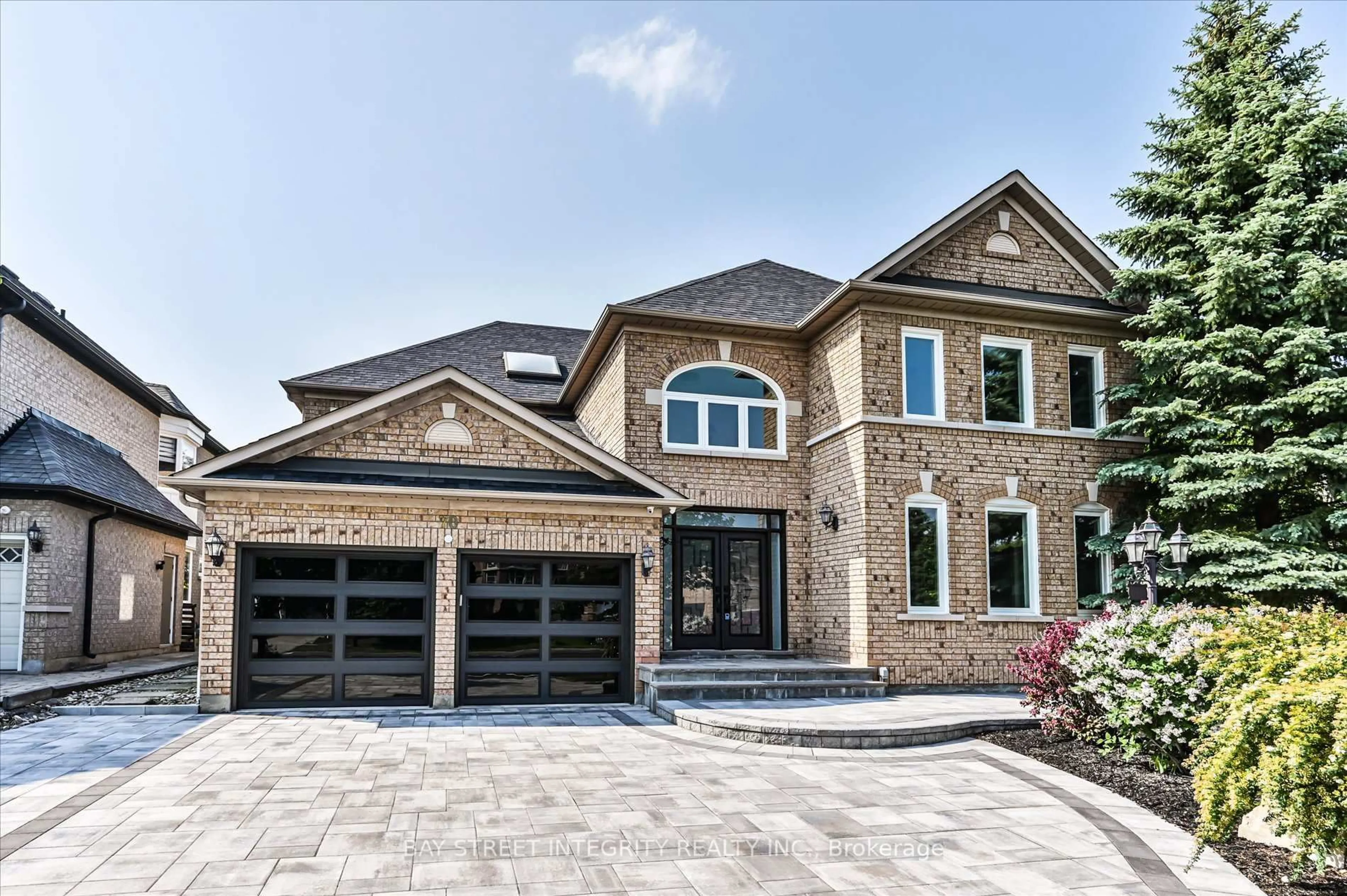 Home with brick exterior material, street for 70 Macrill Rd, Markham Ontario L6C 1W7