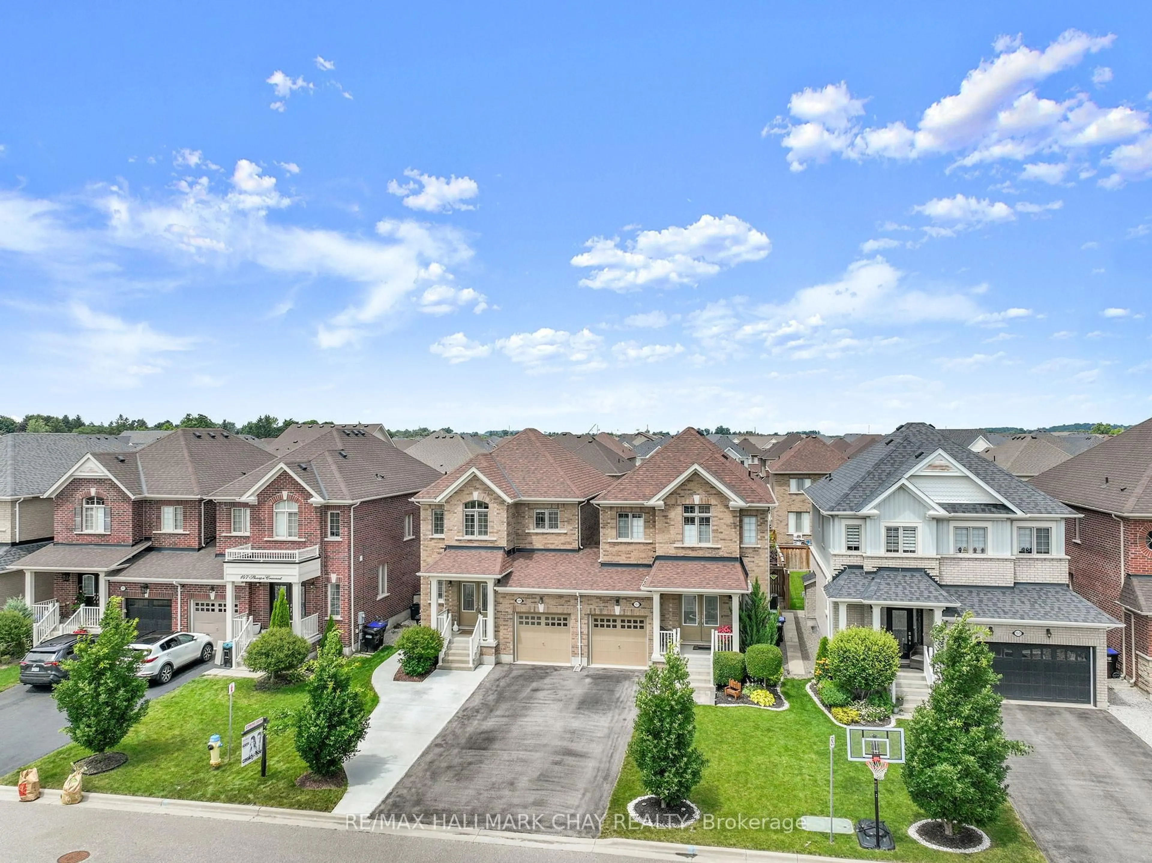 A pic from outside/outdoor area/front of a property/back of a property/a pic from drone, street for 149 Sharpe Cres, New Tecumseth Ontario L0G 1W0