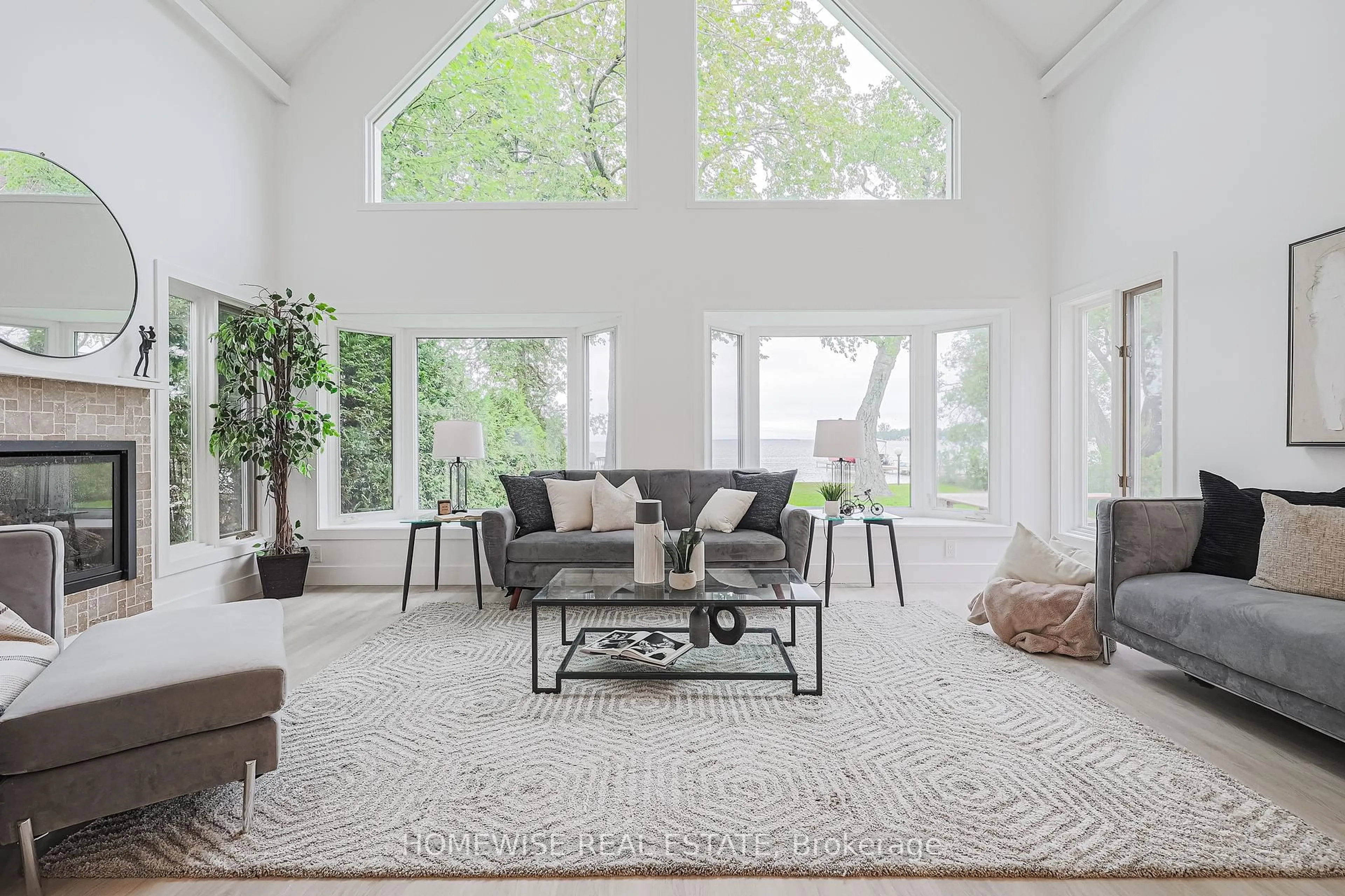 Living room with furniture, carpet floor for 128 Moores Beach Rd, Georgina Ontario L0E 1N0