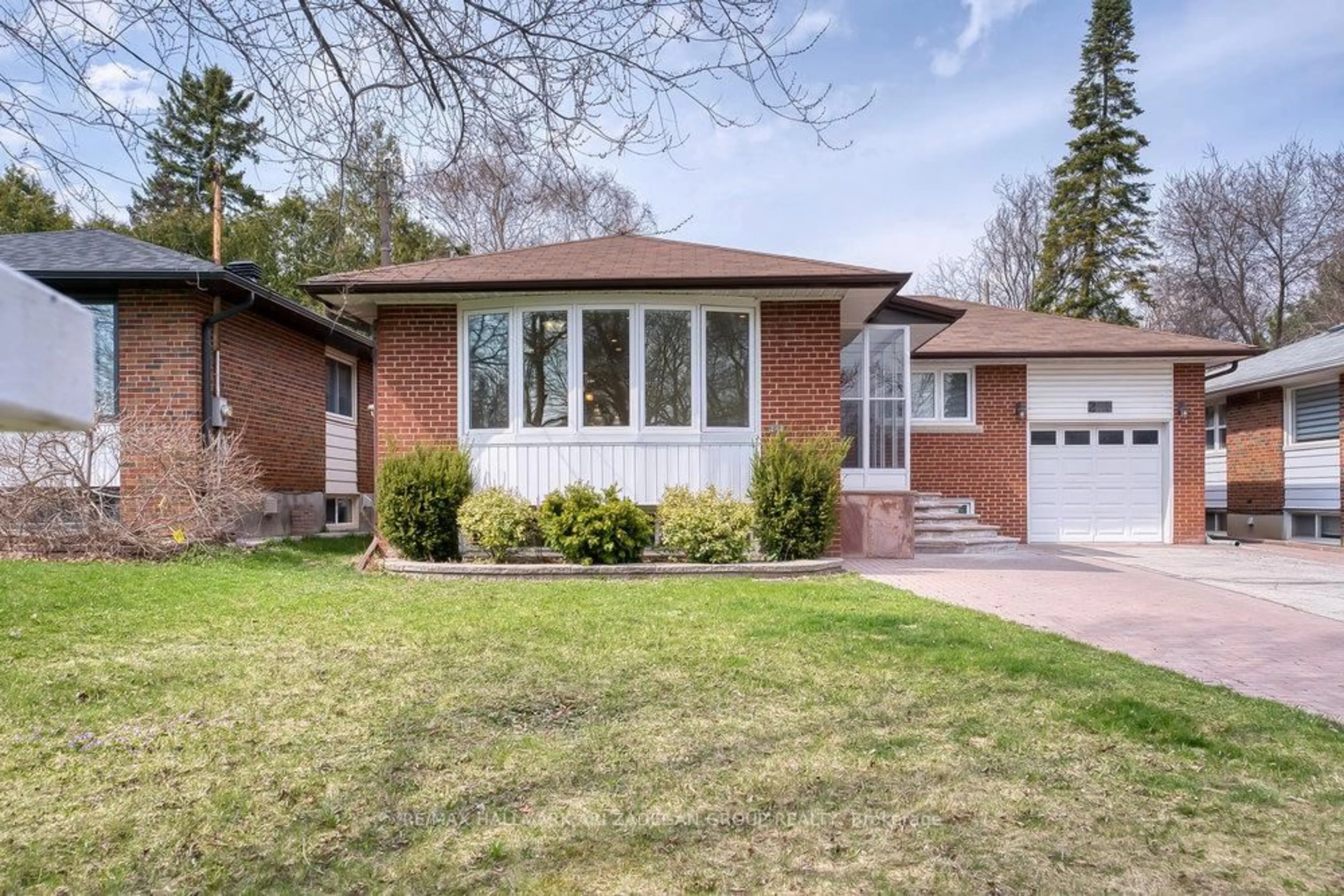 Home with brick exterior material, street for 243 Harrygan Cres, Richmond Hill Ontario L4C 4J2