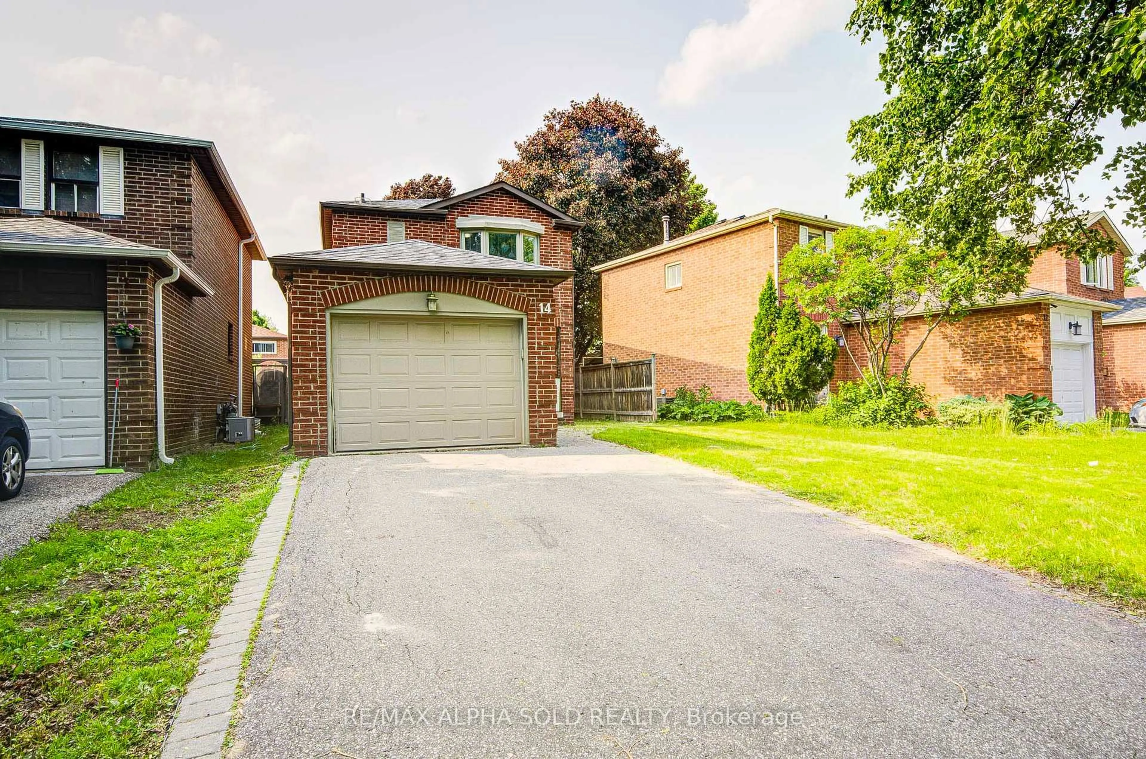 Home with brick exterior material, street for 14 Miley Dr, Markham Ontario L3R 4V3