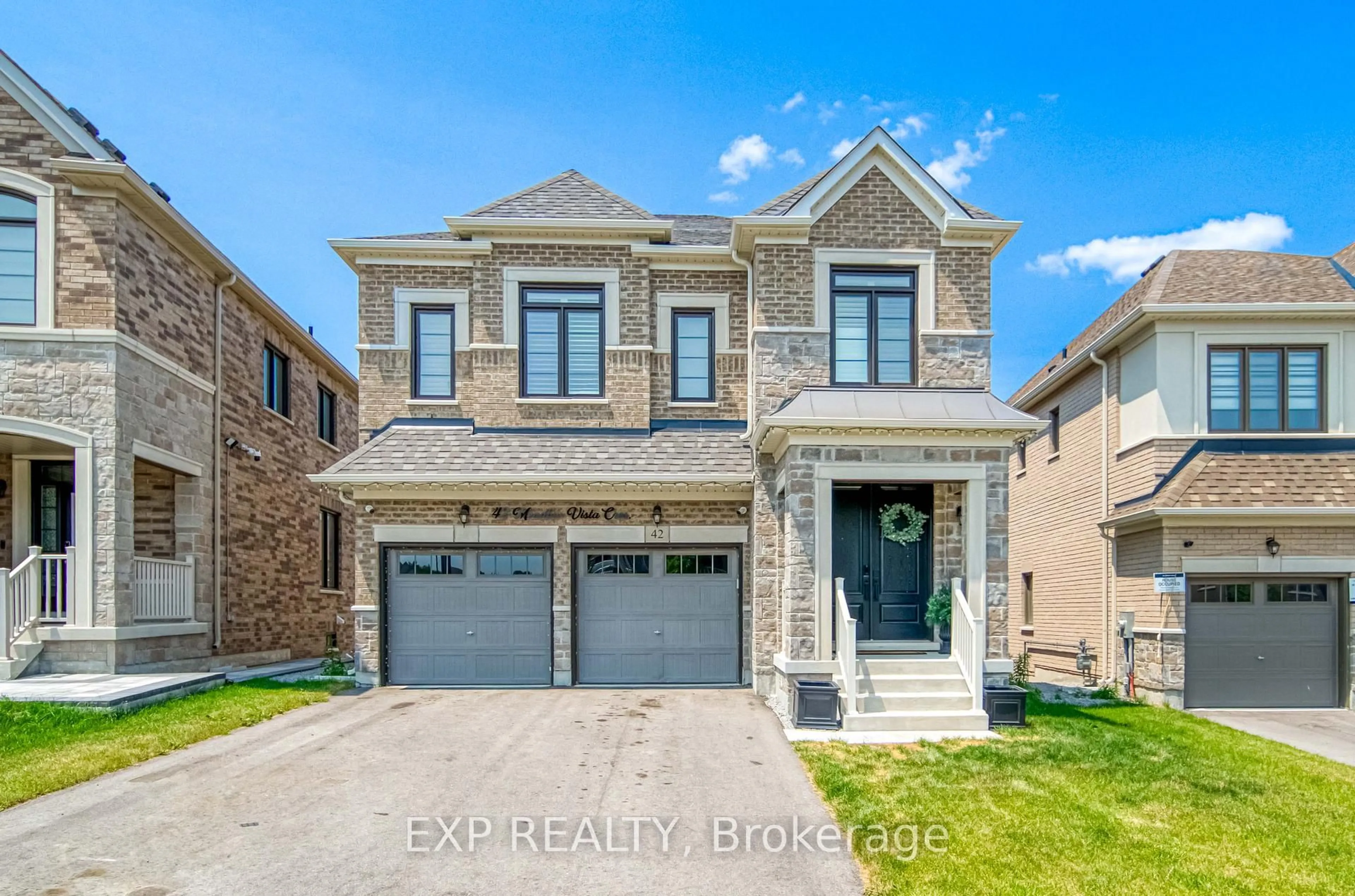 Home with brick exterior material, street for 42 Meadow Vista Cres, East Gwillimbury Ontario L9N 0T4