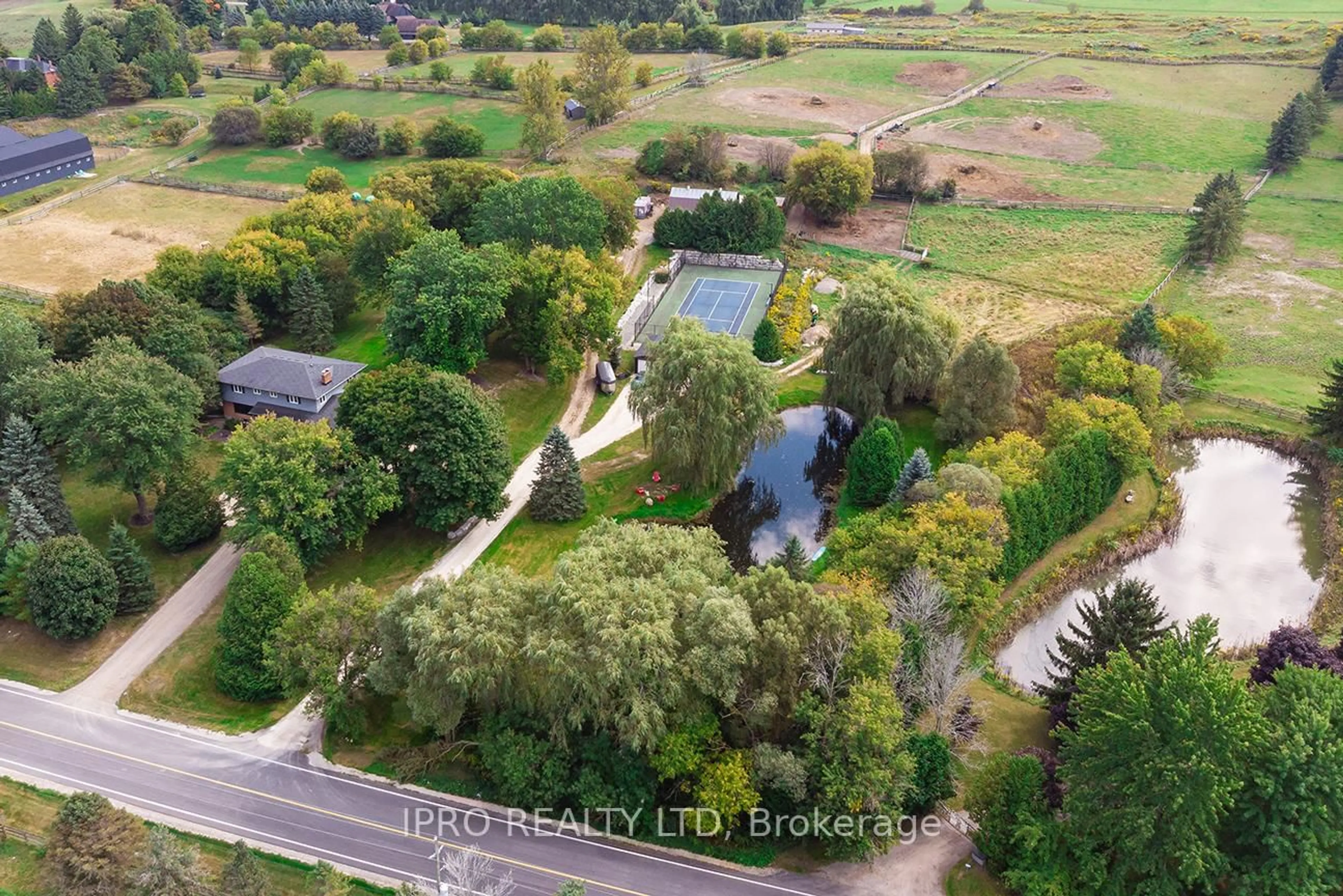 A pic from outside/outdoor area/front of a property/back of a property/a pic from drone, water/lake/river/ocean view for 6845 19th Sdrd, King Ontario L0G 1T0