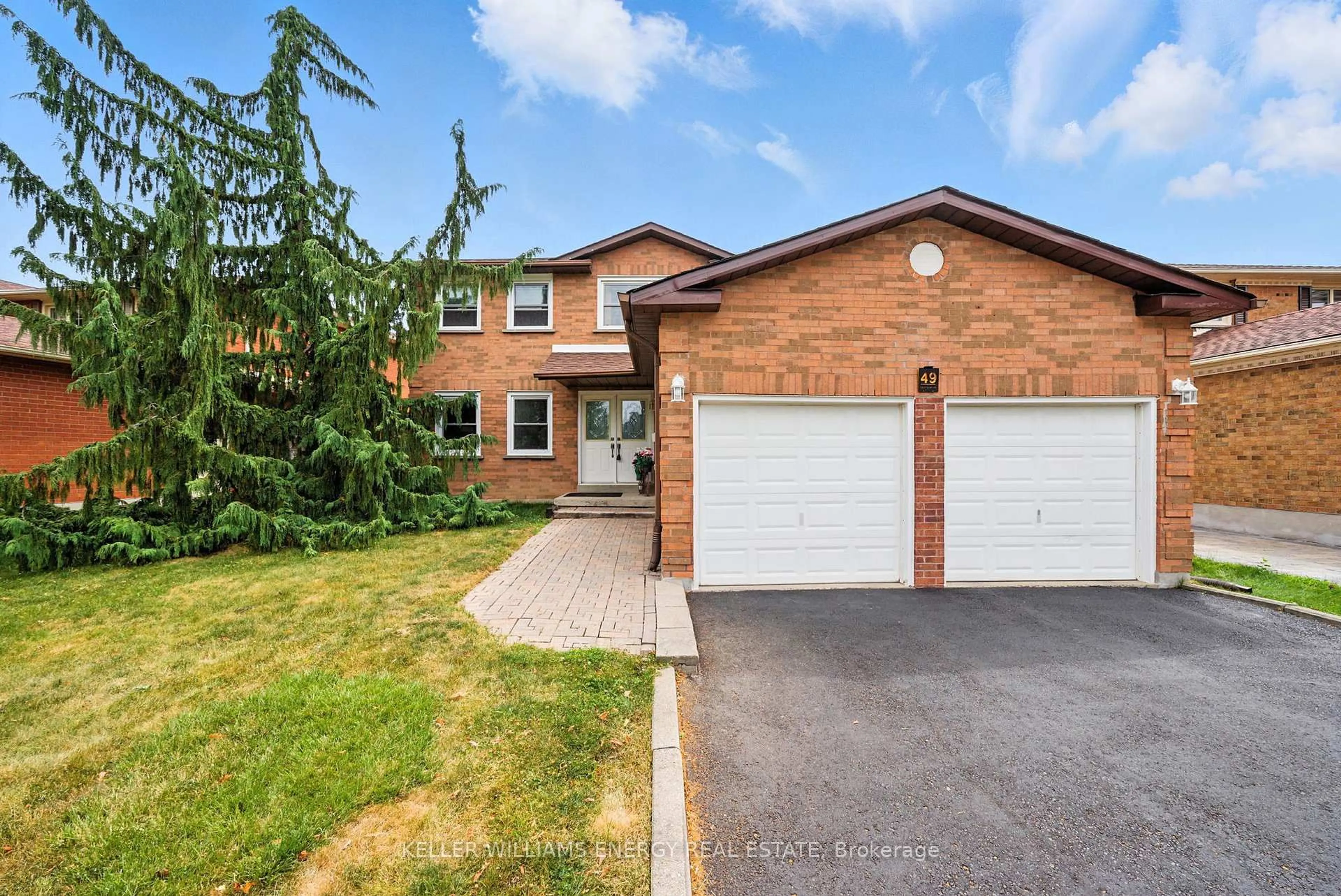 Home with brick exterior material, street for 49 Cairns Dr, Markham Ontario L3P 6G9