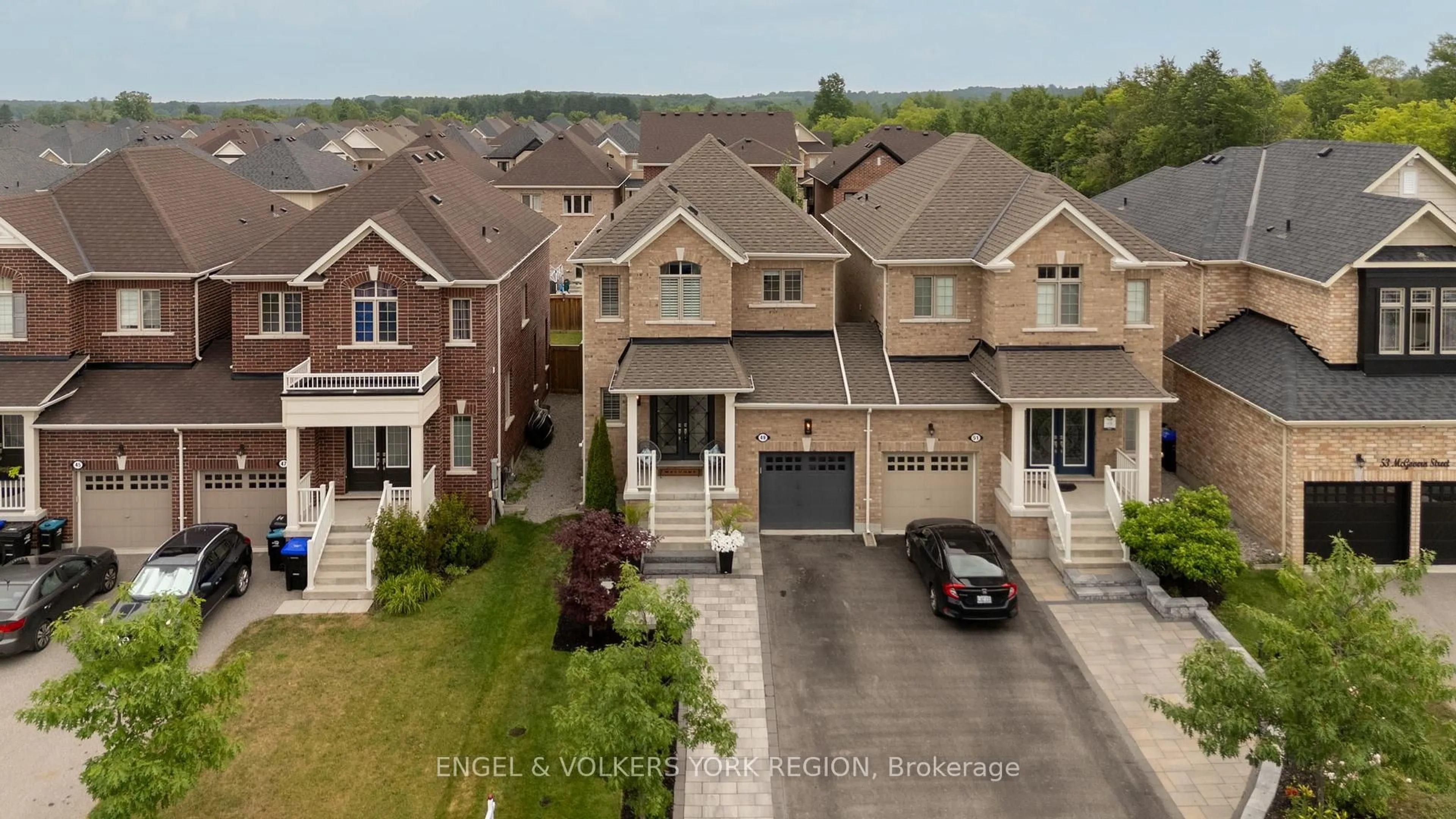 A pic from outside/outdoor area/front of a property/back of a property/a pic from drone, street for 49 McGovern St, New Tecumseth Ontario L0G 1W0
