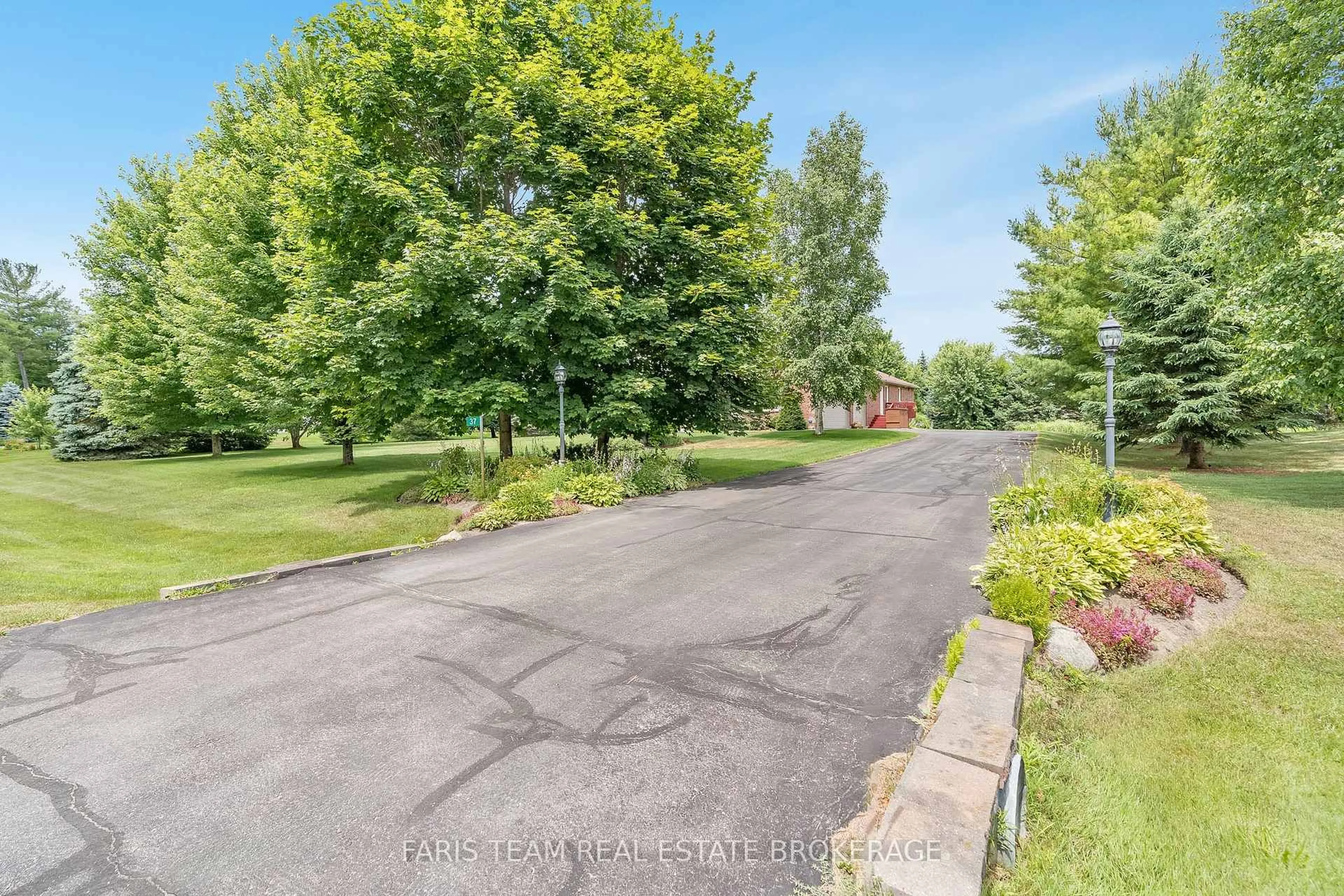 A pic from outside/outdoor area/front of a property/back of a property/a pic from drone, water/lake/river/ocean view for 37 Cindy Lane, Adjala-Tosorontio Ontario L0M 1M0