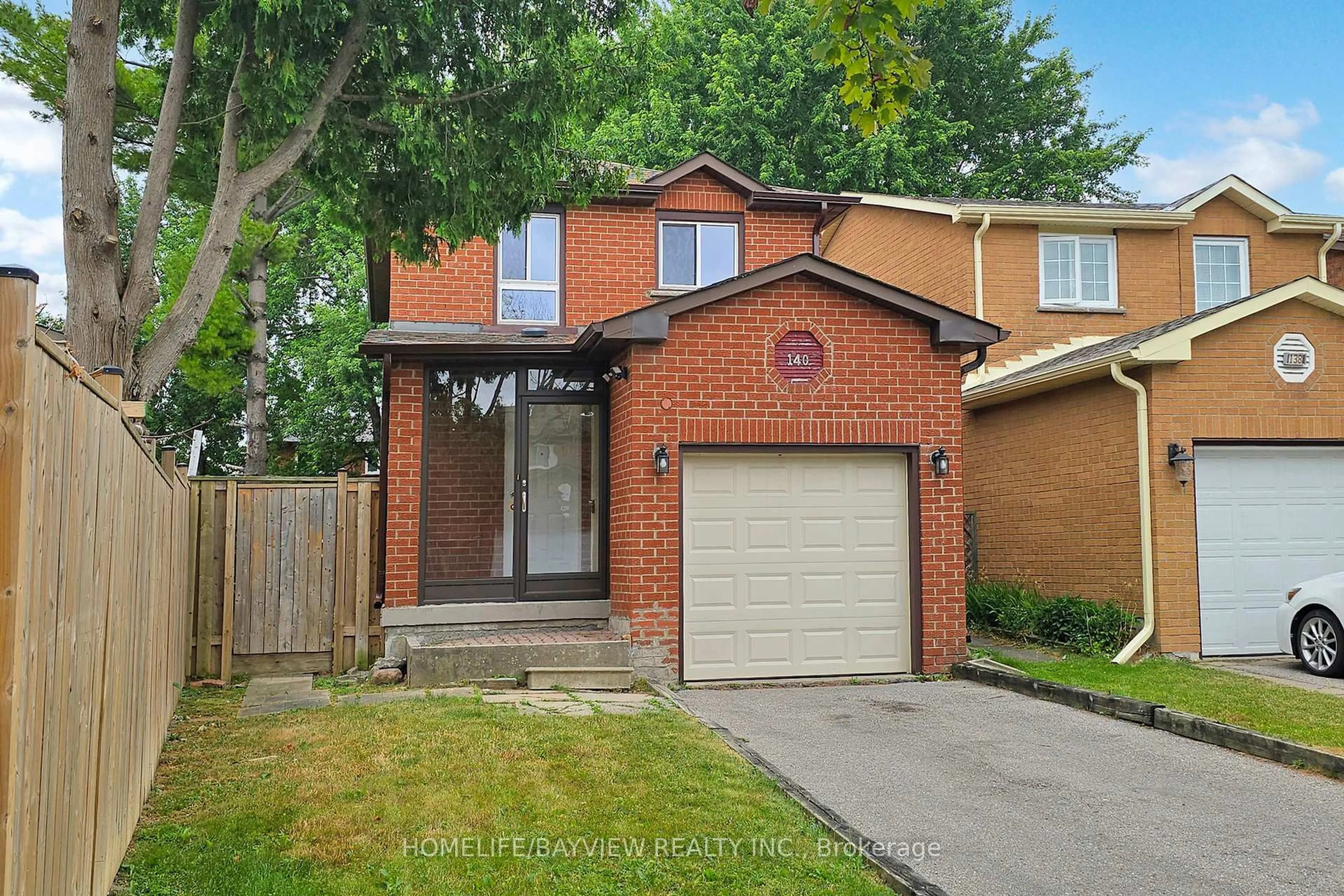 Home with brick exterior material, street for 140 Ashmore Cres, Markham Ontario L3R 6T7
