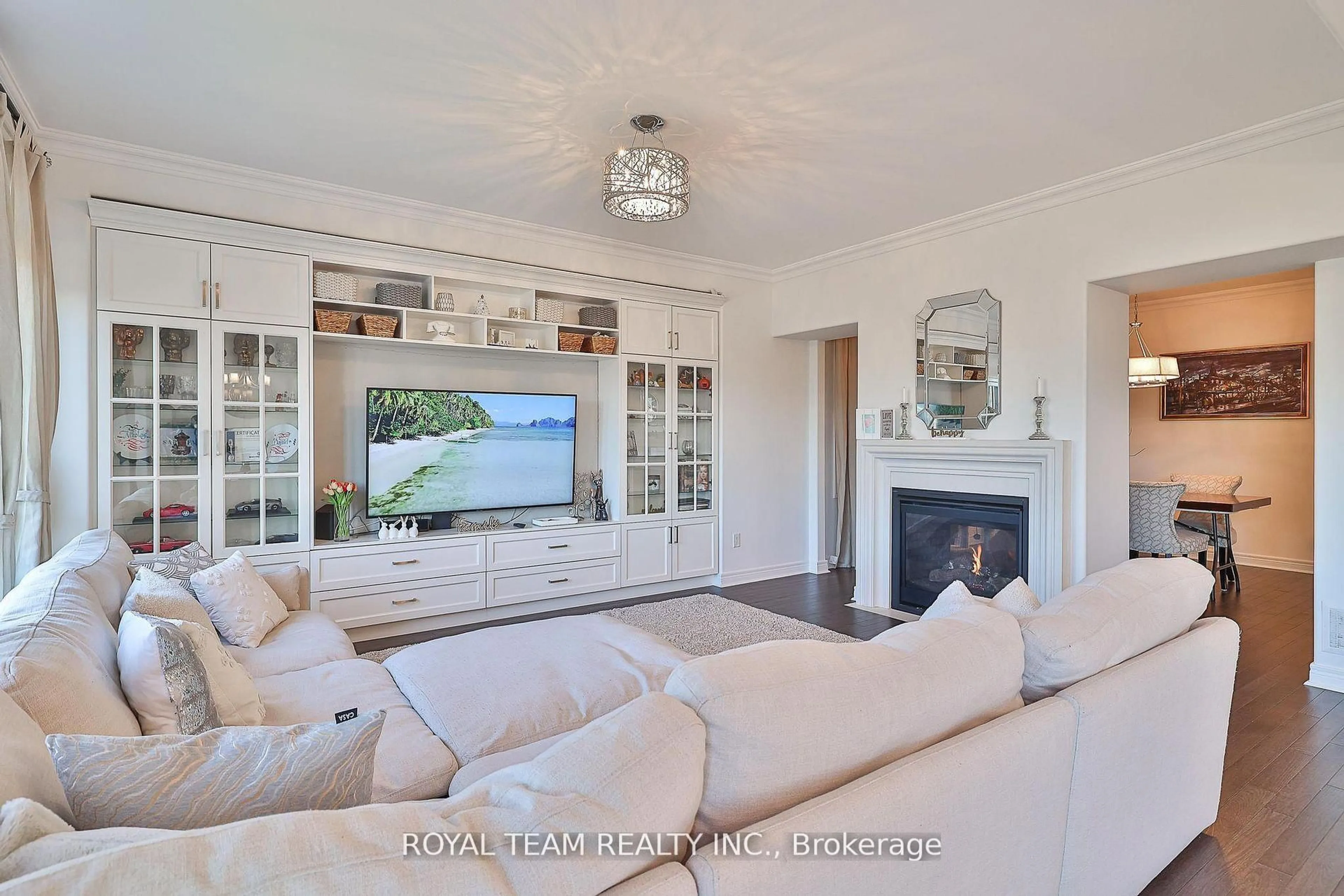 Living room with furniture, wood/laminate floor for 227 Frederick Curran Lane, Newmarket Ontario L3X 0B9