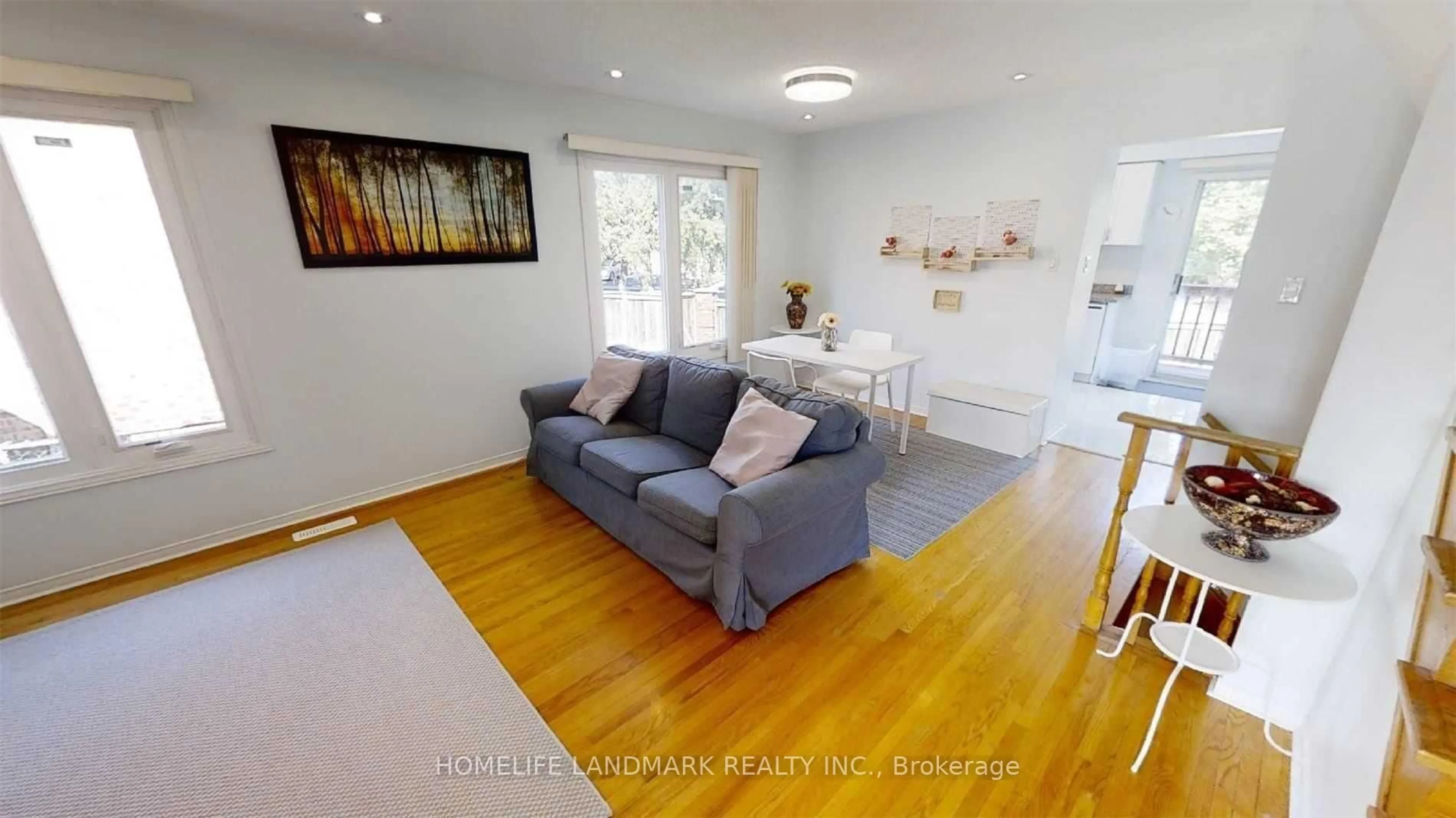 Living room with furniture, wood/laminate floor for 41 Hinda Lane, Vaughan Ontario L4J 6S2