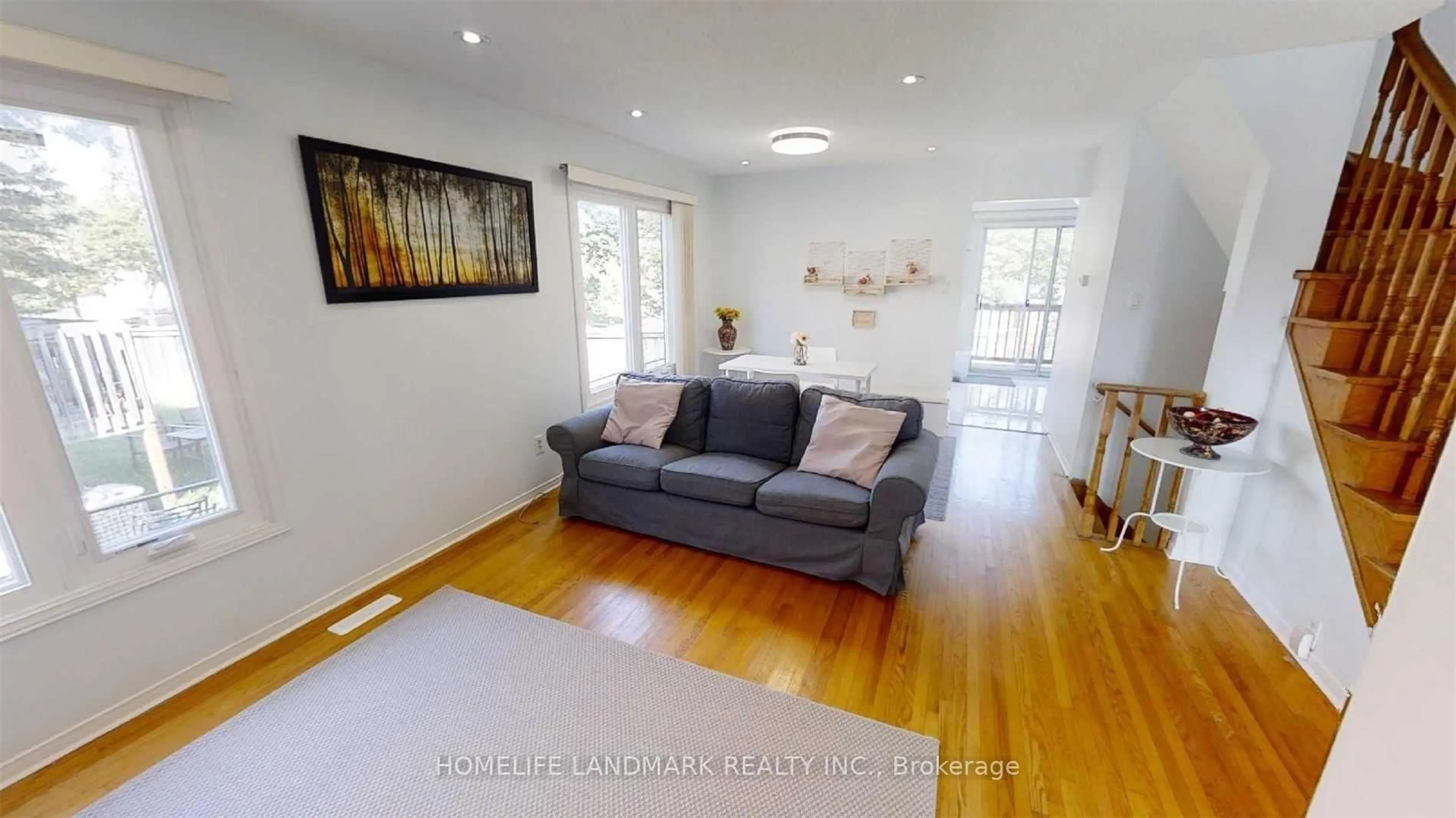 Living room with furniture, wood/laminate floor for 41 Hinda Lane, Vaughan Ontario L4J 6S2