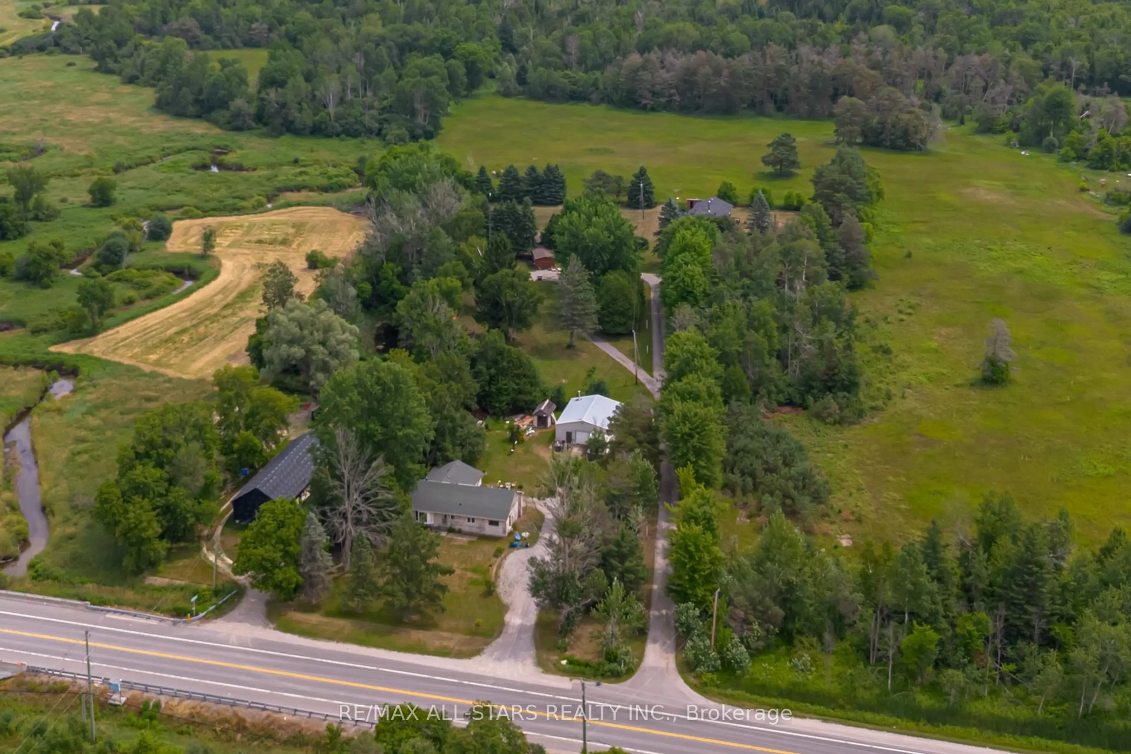 A pic from outside/outdoor area/front of a property/back of a property/a pic from drone, unknown for 21747 Highway 48, East Gwillimbury Ontario L0G 1M0