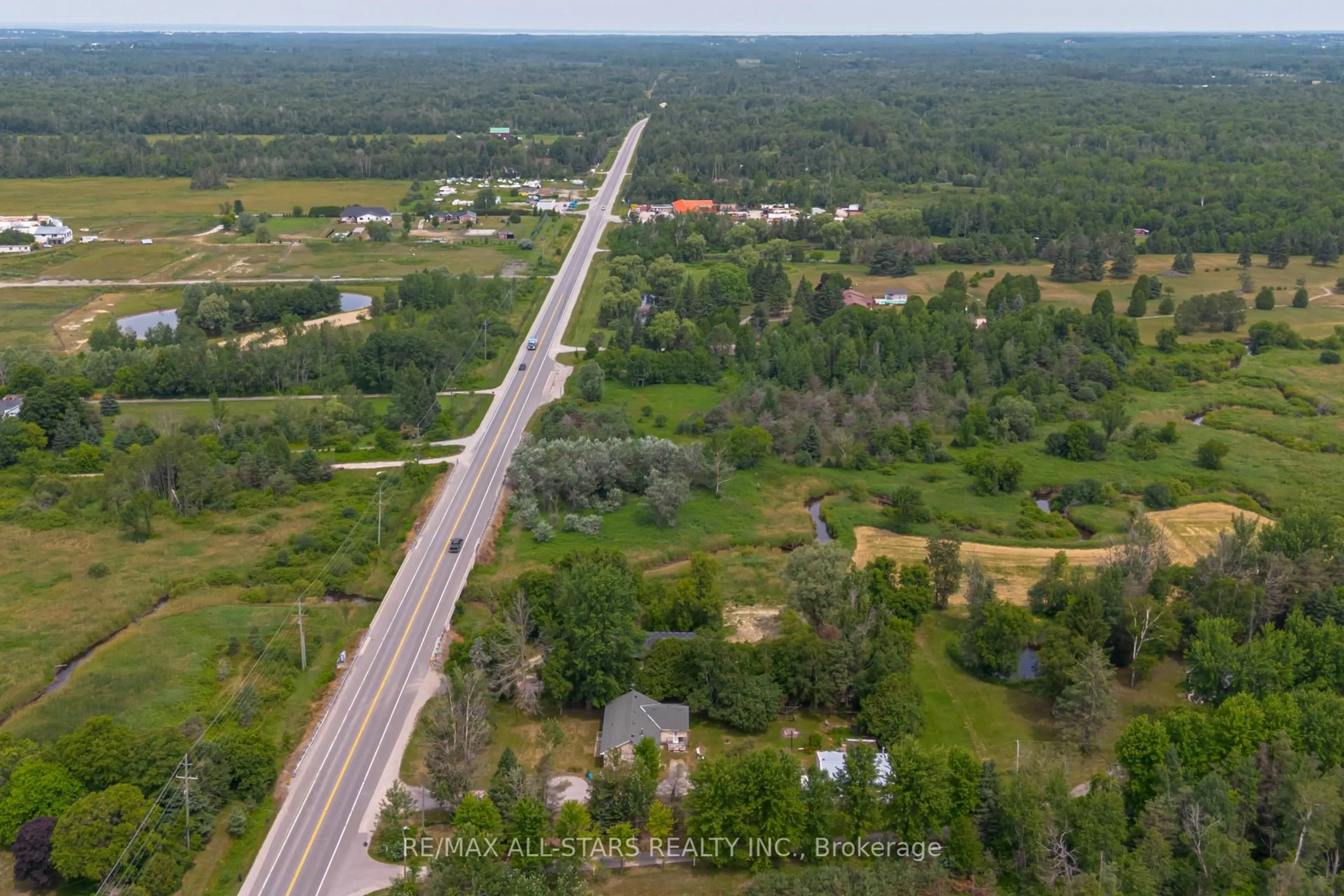 A pic from outside/outdoor area/front of a property/back of a property/a pic from drone, street for 21747 Highway 48, East Gwillimbury Ontario L0G 1M0