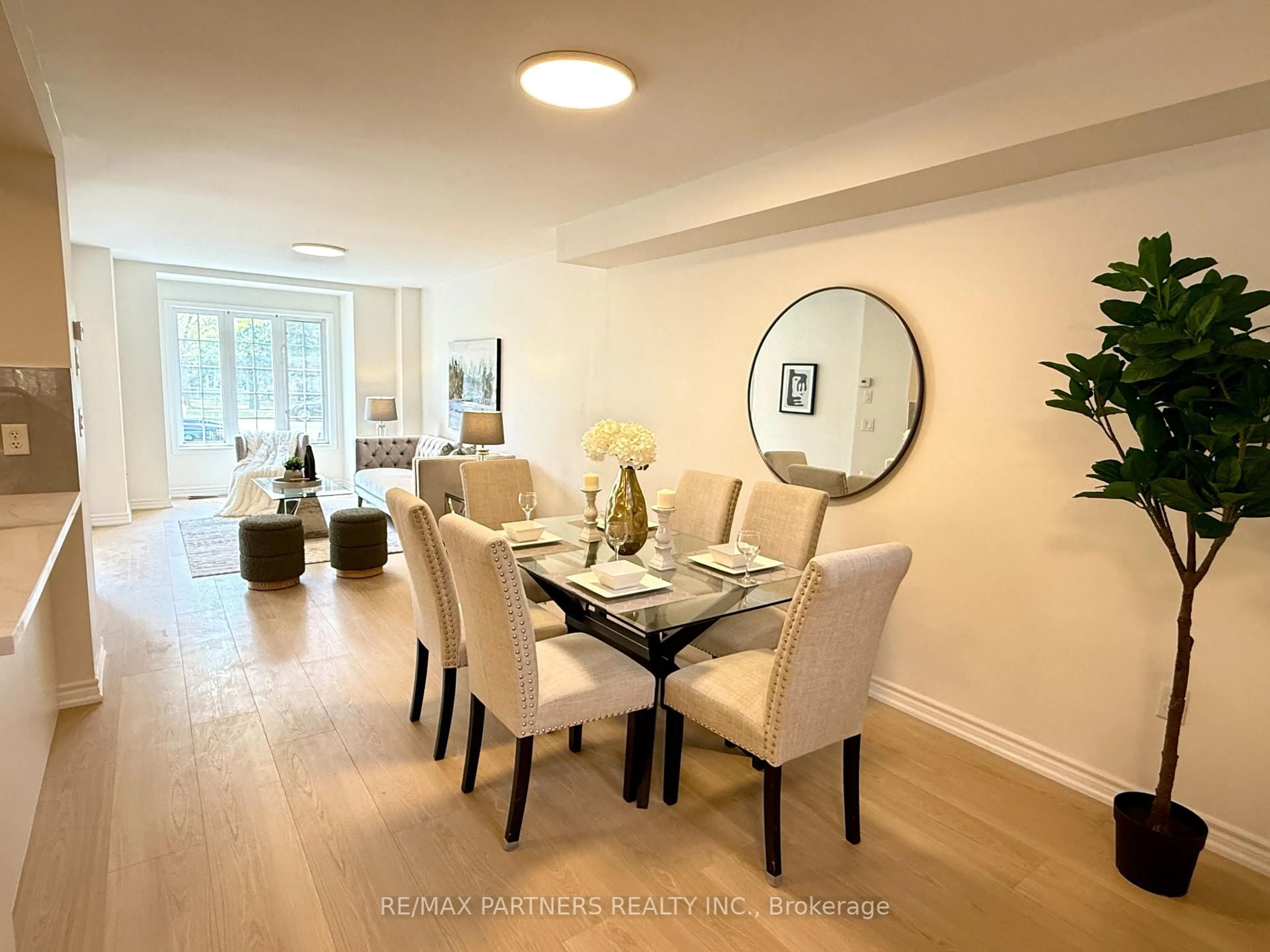 Dining room, wood/laminate floor for 516 Bur Oak Ave, Markham Ontario L6C 3A9