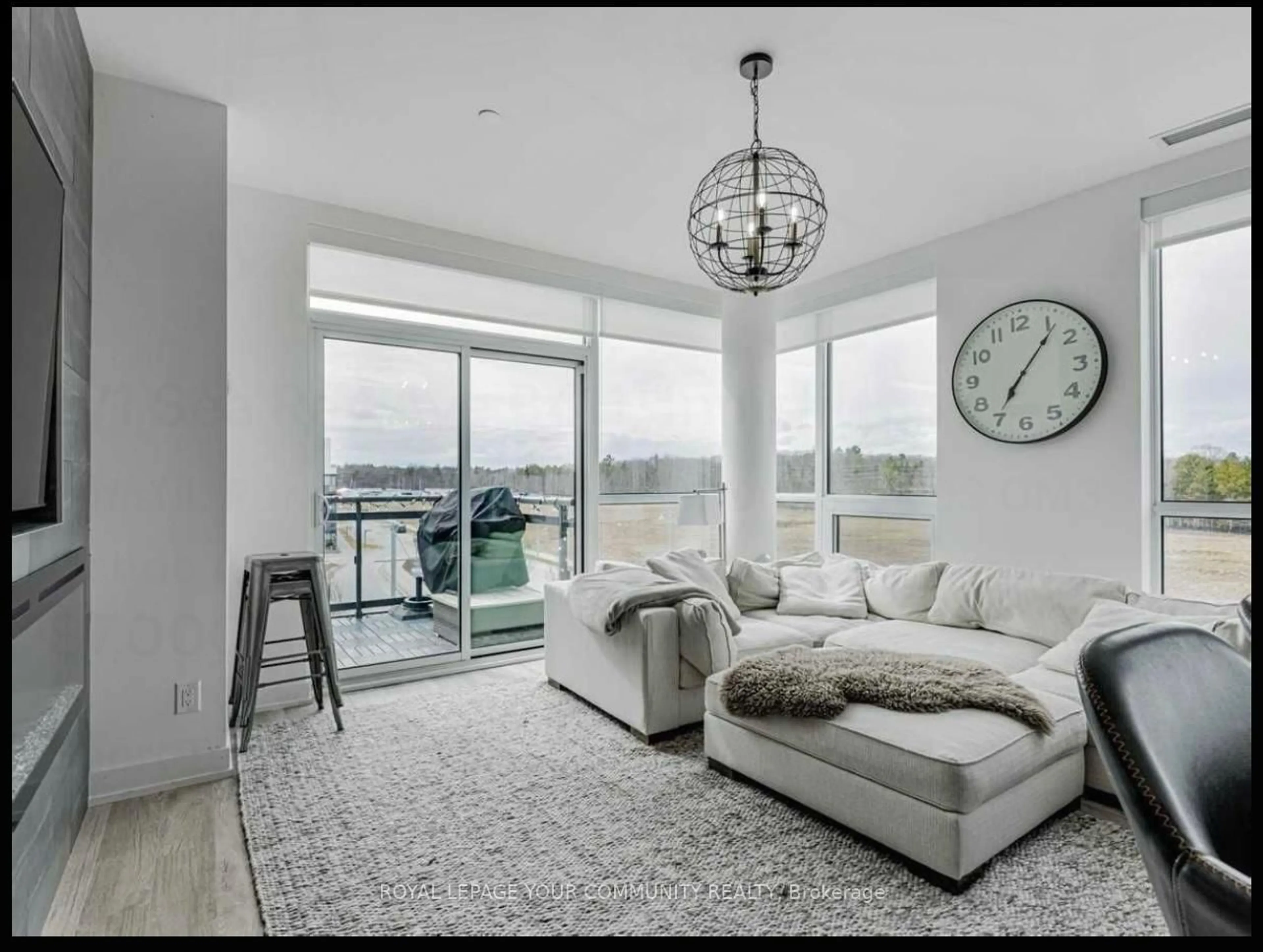 Living room with furniture, unknown for 271 Sea Ray Ave #B411, Innisfil Ontario L9S 0M3