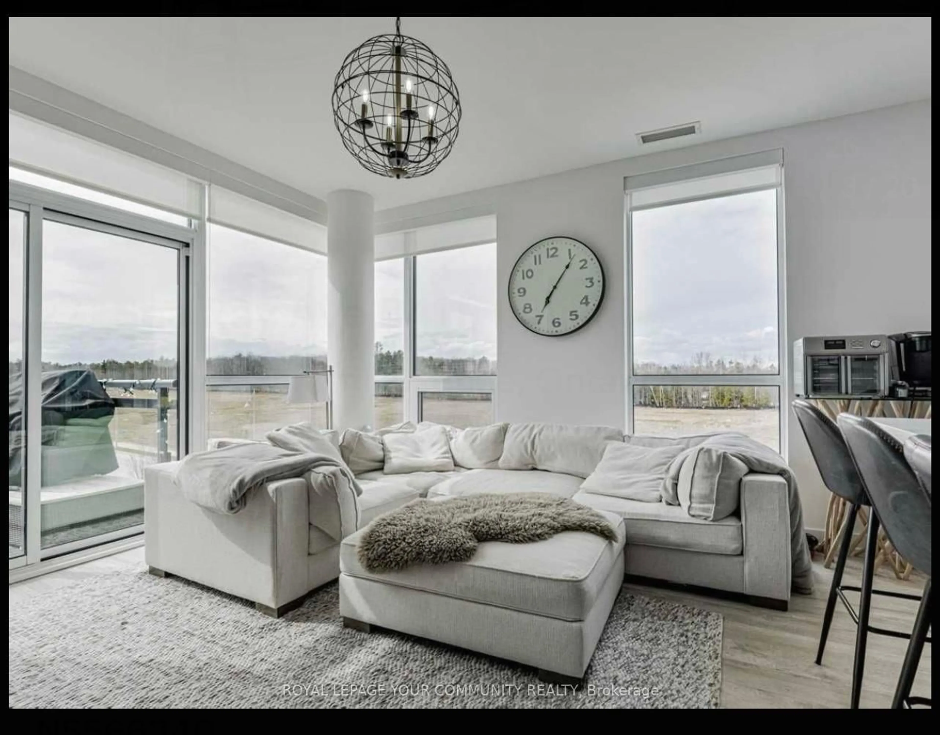 Living room with furniture, unknown for 271 Sea Ray Ave #B411, Innisfil Ontario L9S 0M3