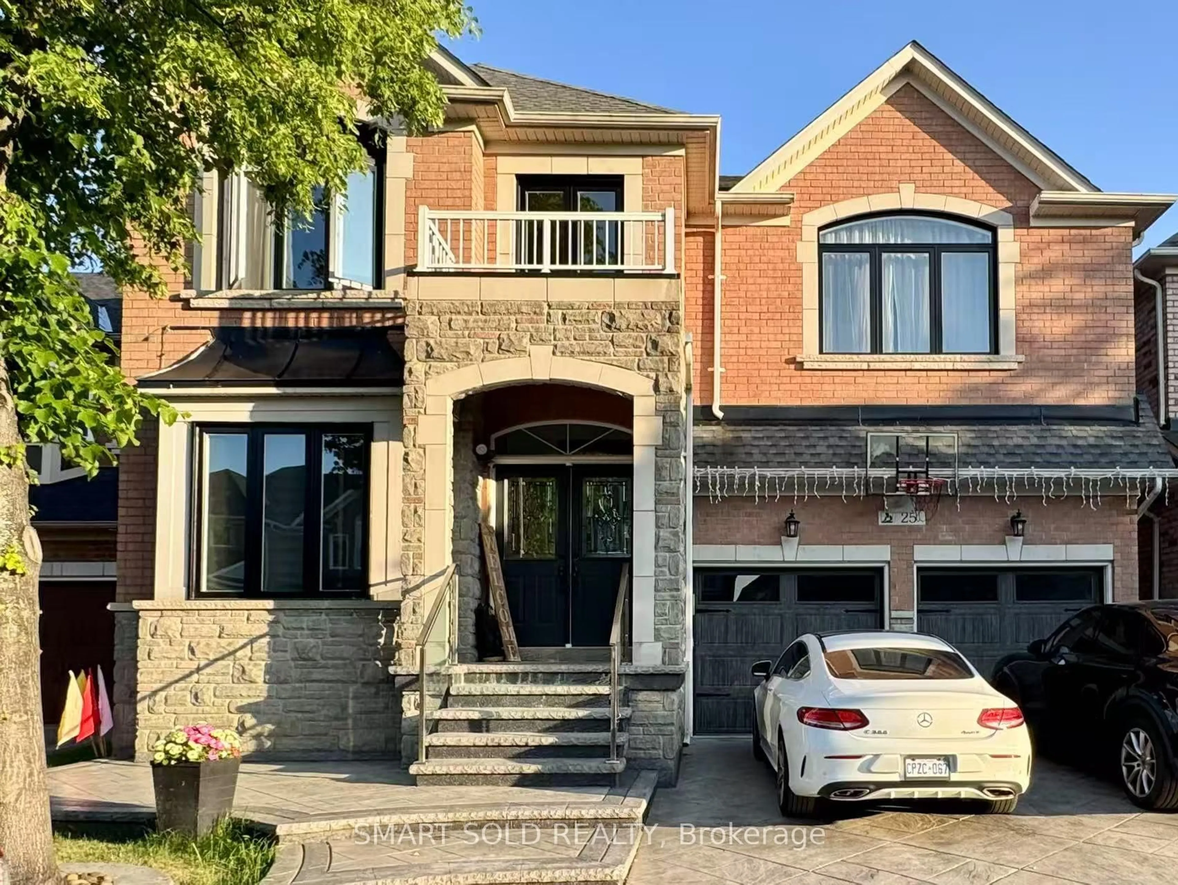 Home with brick exterior material, street for 25 Barnstone Dr, Markham Ontario L6E 2G9