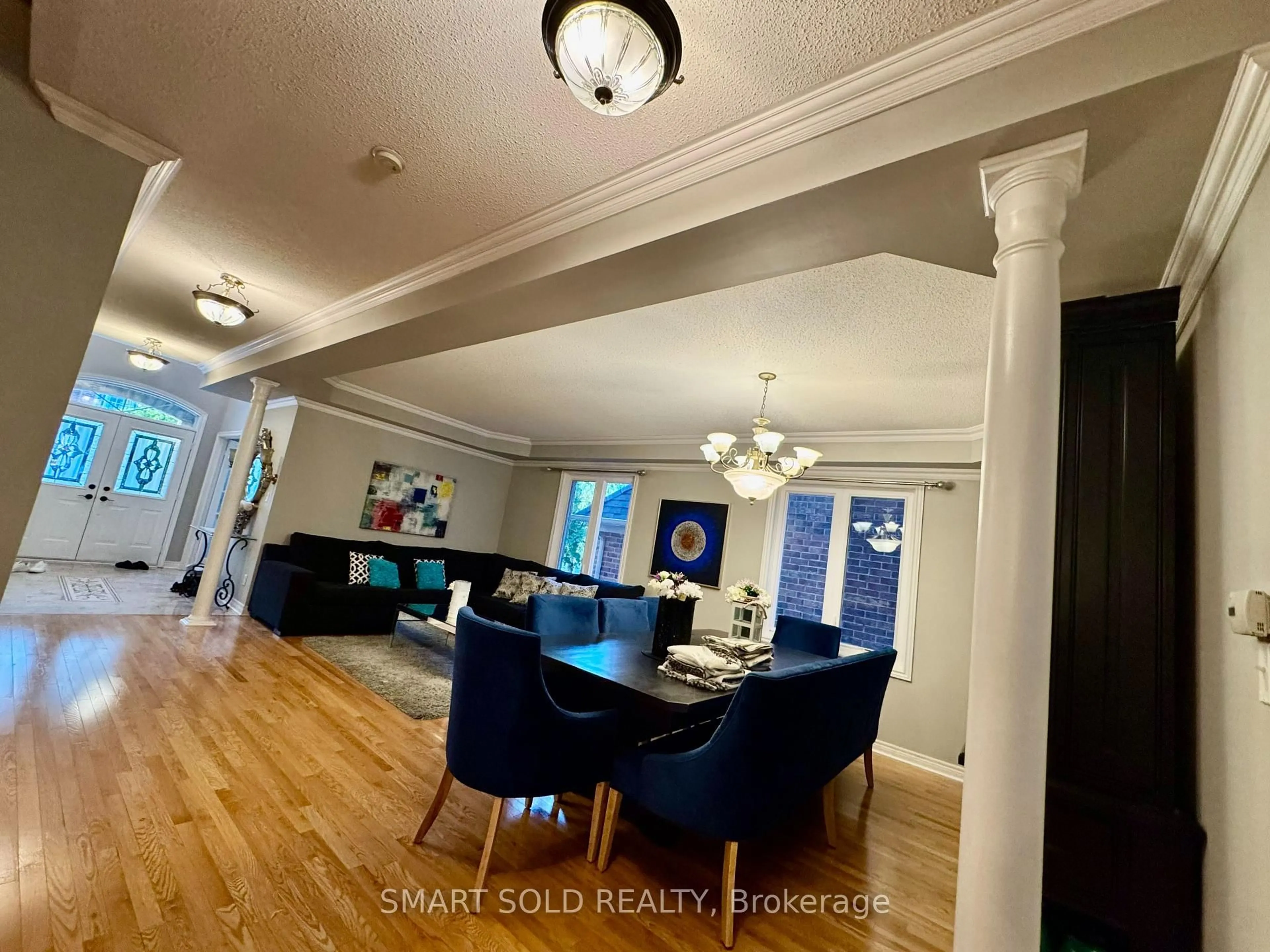 Dining room, wood/laminate floor for 25 Barnstone Dr, Markham Ontario L6E 2G9