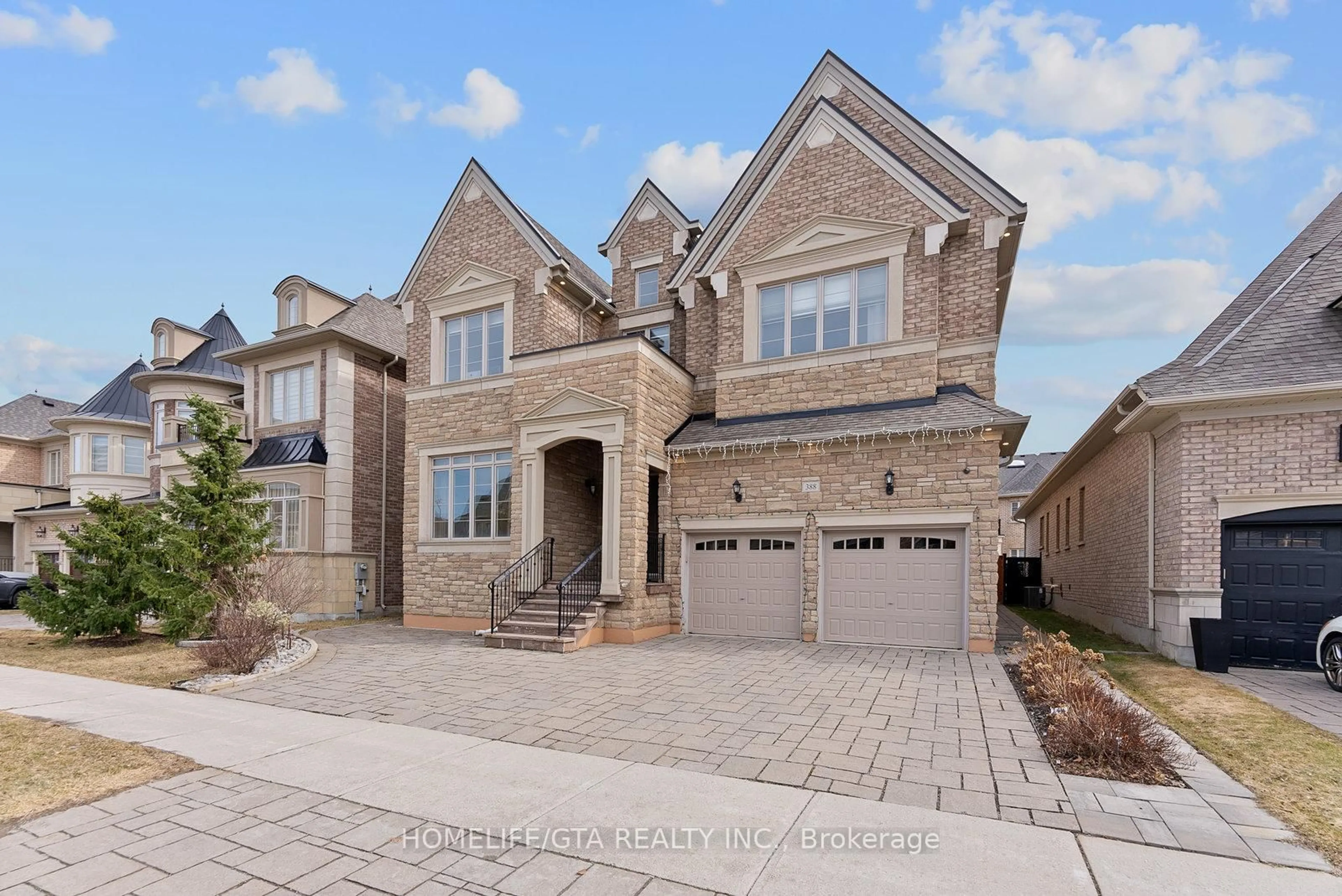 Home with brick exterior material, street for 388 Woodgate Pines Dr, Vaughan Ontario L4H 3X5