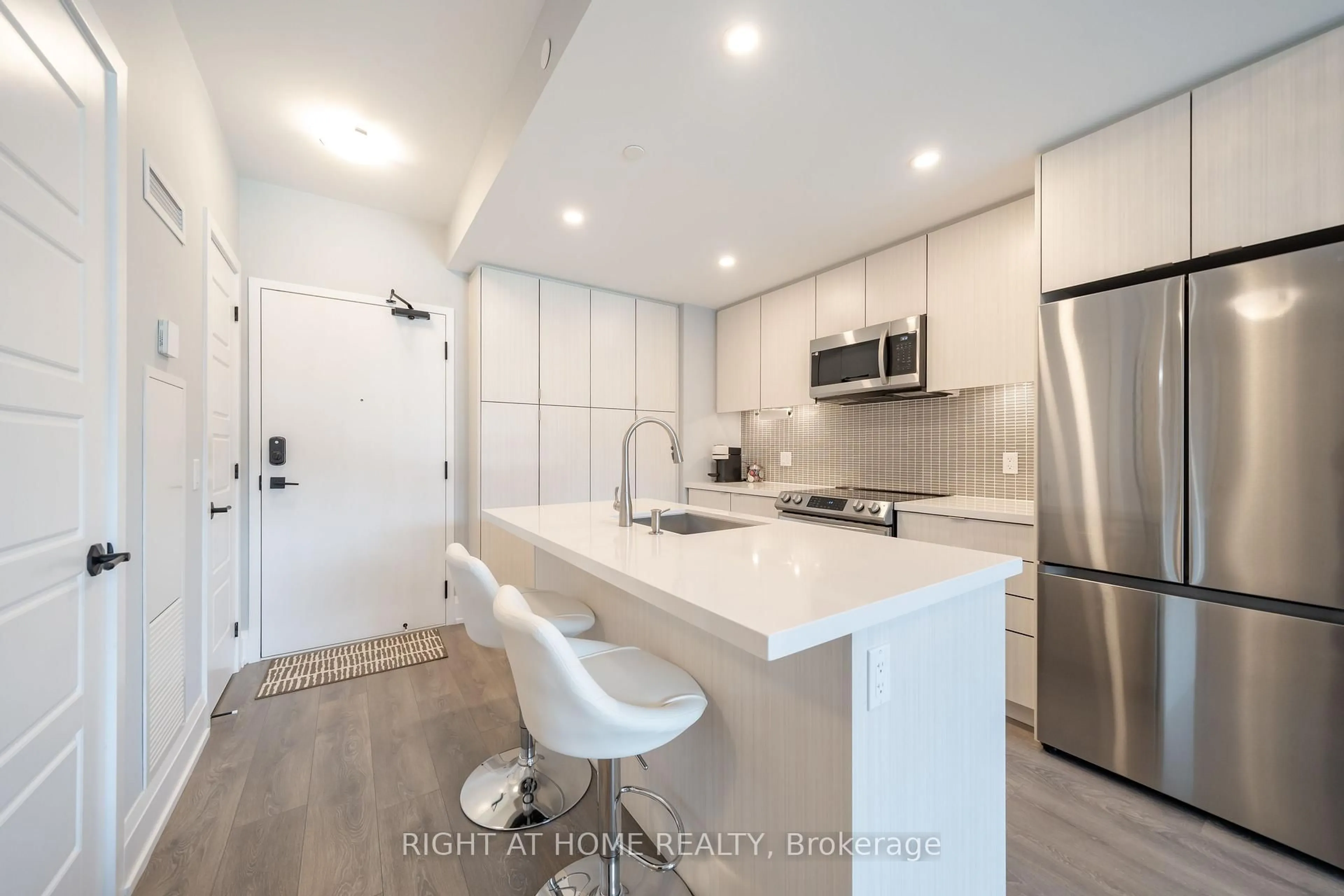 Open concept kitchen, unknown for 415 Sea Ray Ave #202, Innisfil Ontario L9S 0R5