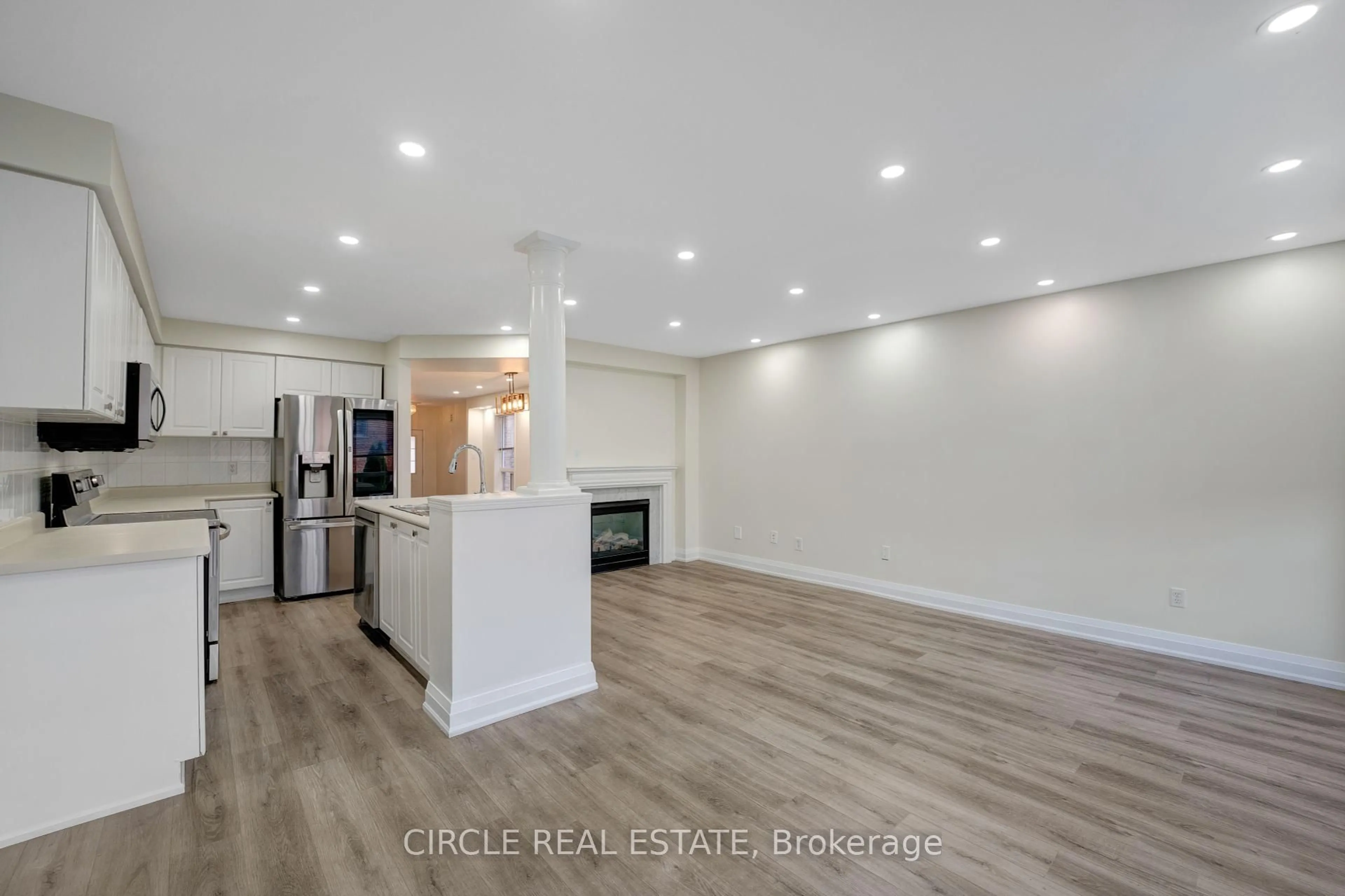 Open concept kitchen, wood/laminate floor for 21 Casabel Dr, Vaughan Ontario L6A 3M5