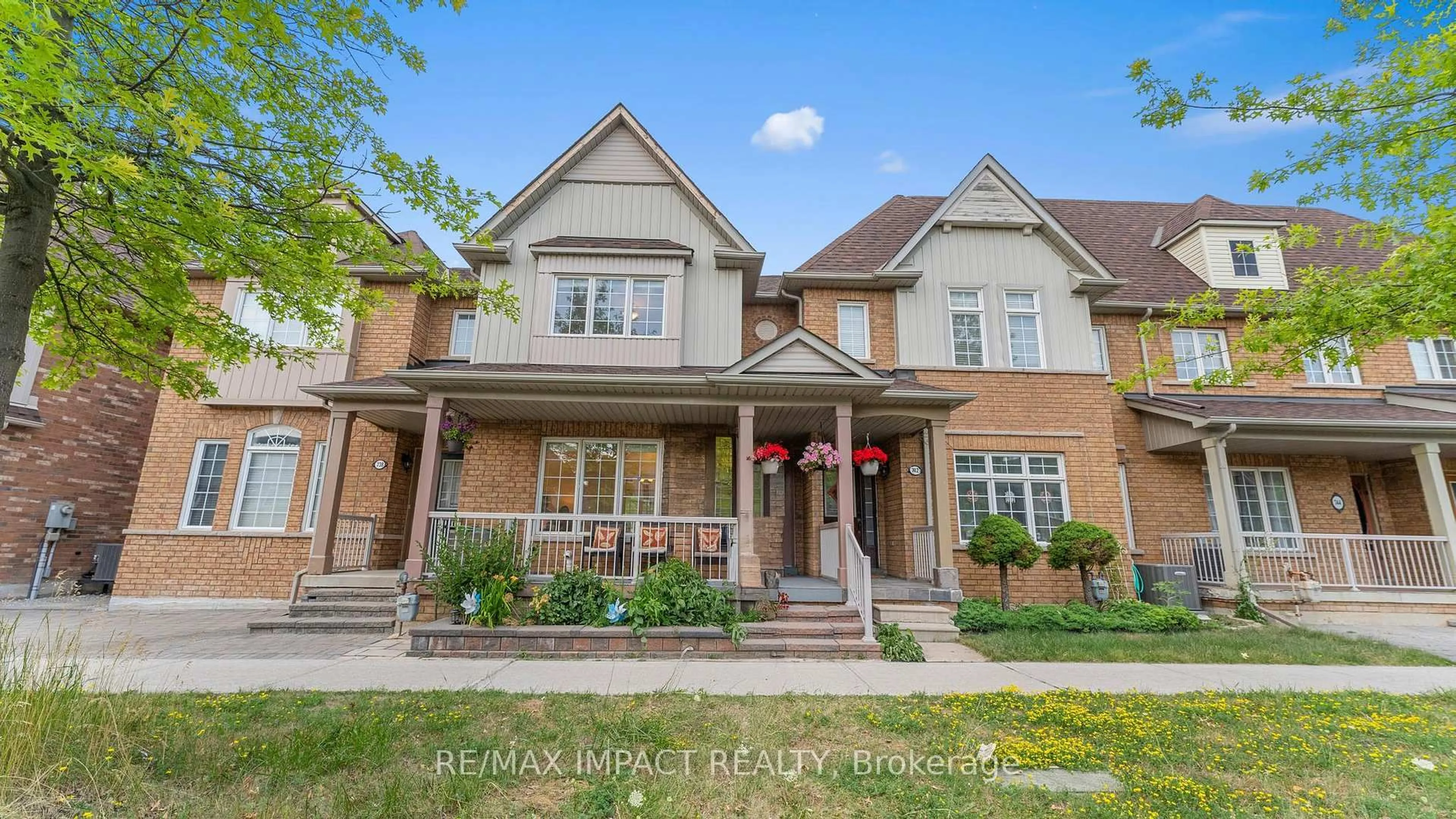 Home with brick exterior material, street for 740 Bur Oak Ave, Markham Ontario L6E 1R2