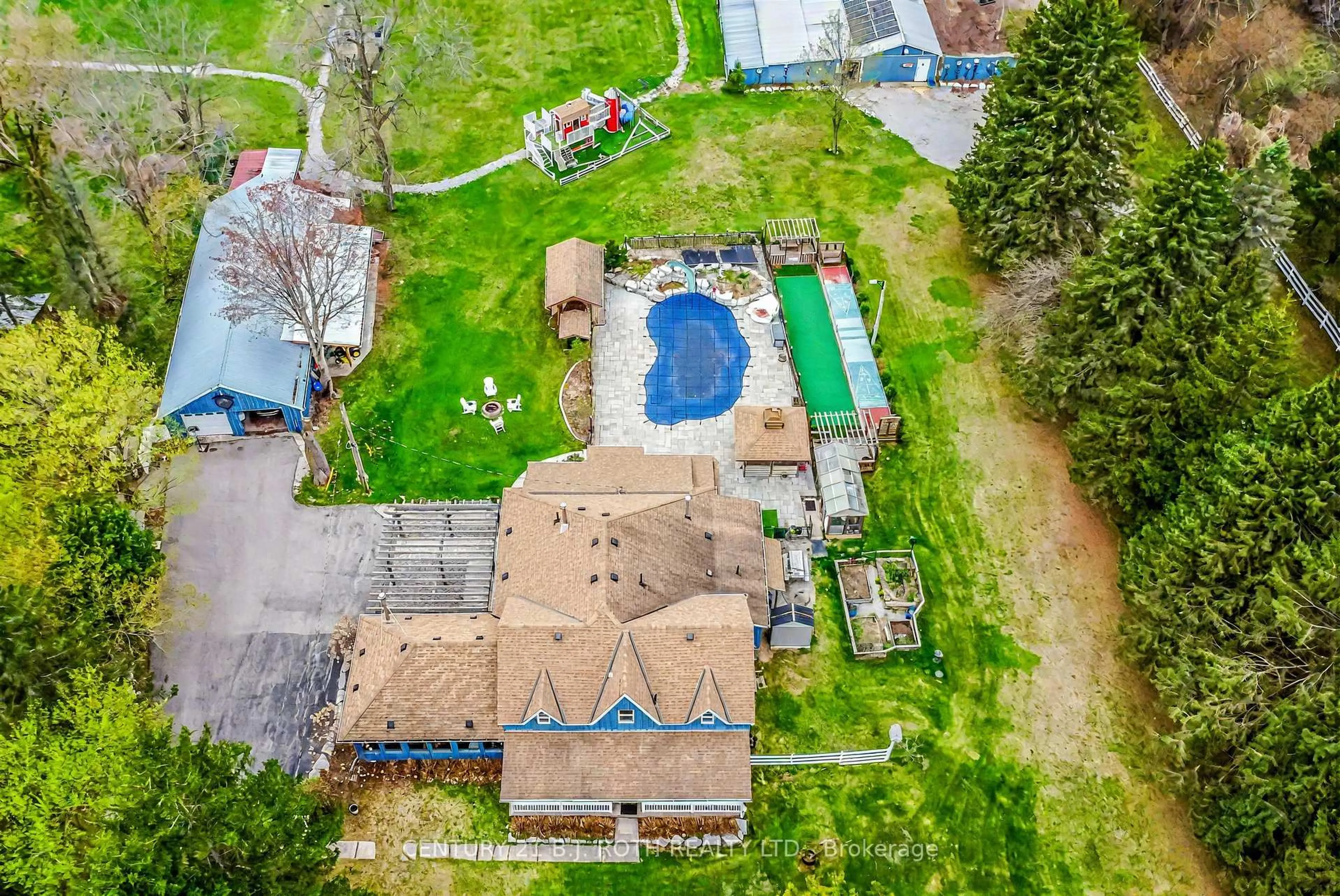 A pic from outside/outdoor area/front of a property/back of a property/a pic from drone, unknown for 8726 9th Line, Essa Ontario L0M 1T0