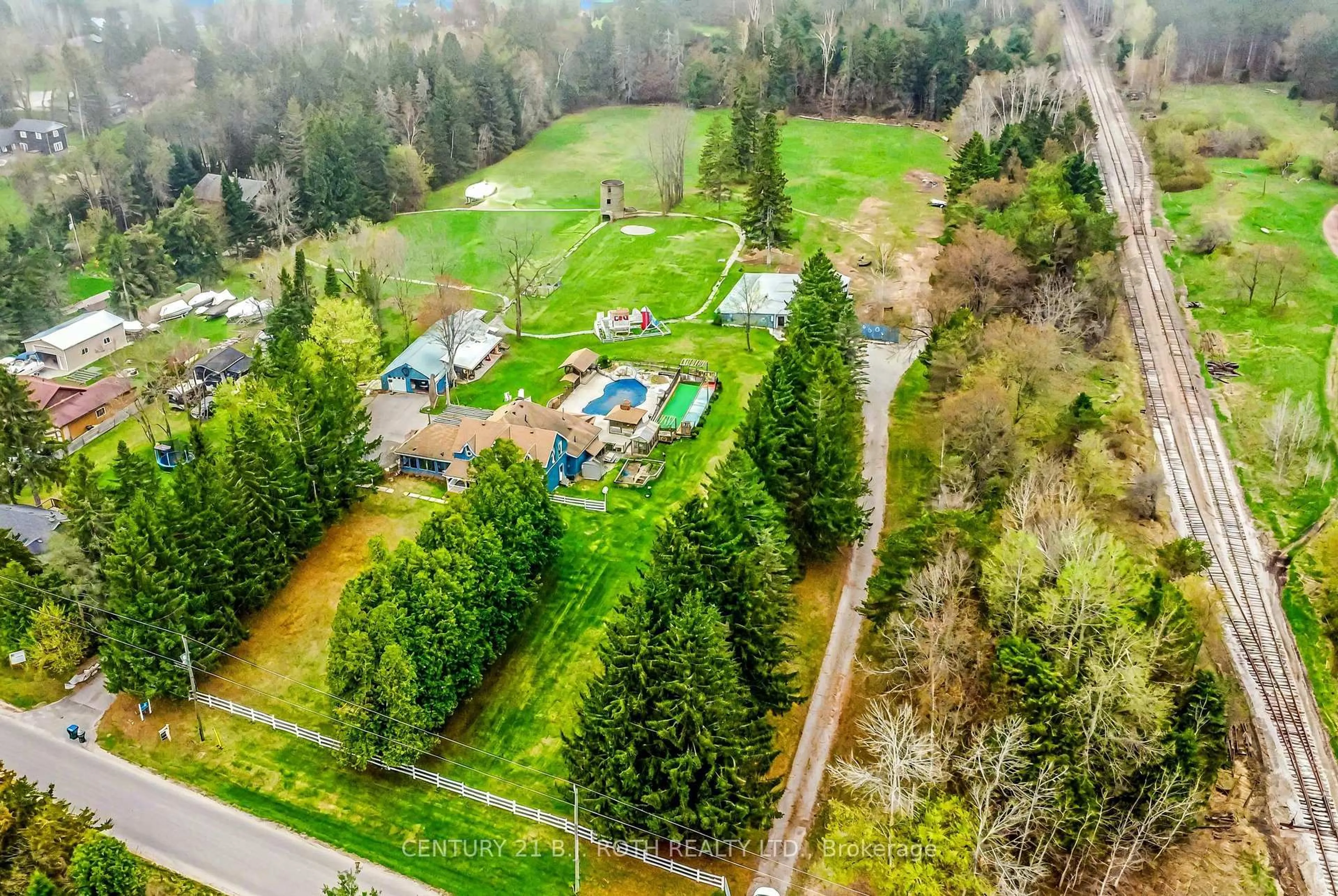 A pic from outside/outdoor area/front of a property/back of a property/a pic from drone, forest/trees view for 8726 9th Line, Essa Ontario L0M 1T0