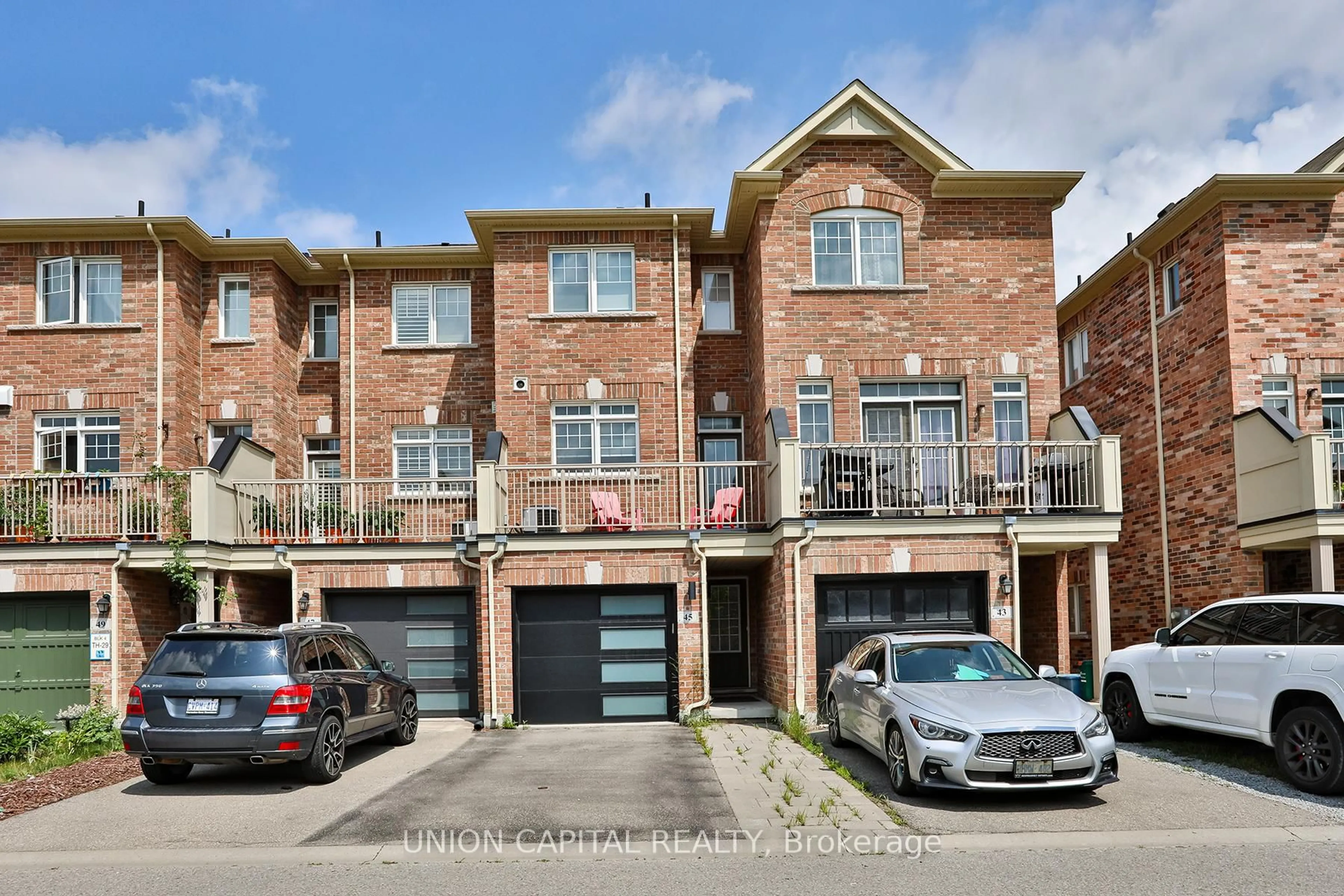 Home with brick exterior material, street for 45 Dundas Way, Markham Ontario L6E 0R7