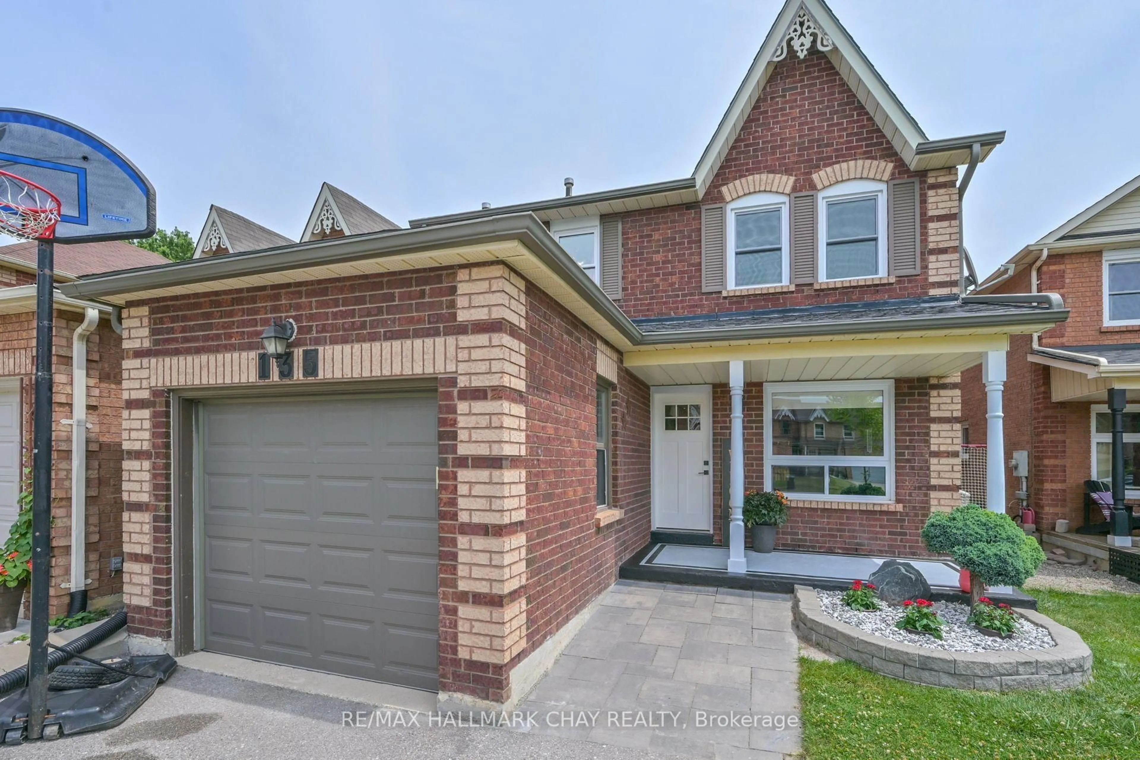 Home with brick exterior material, street for 135 Heydon Ave, New Tecumseth Ontario L9R 1N6