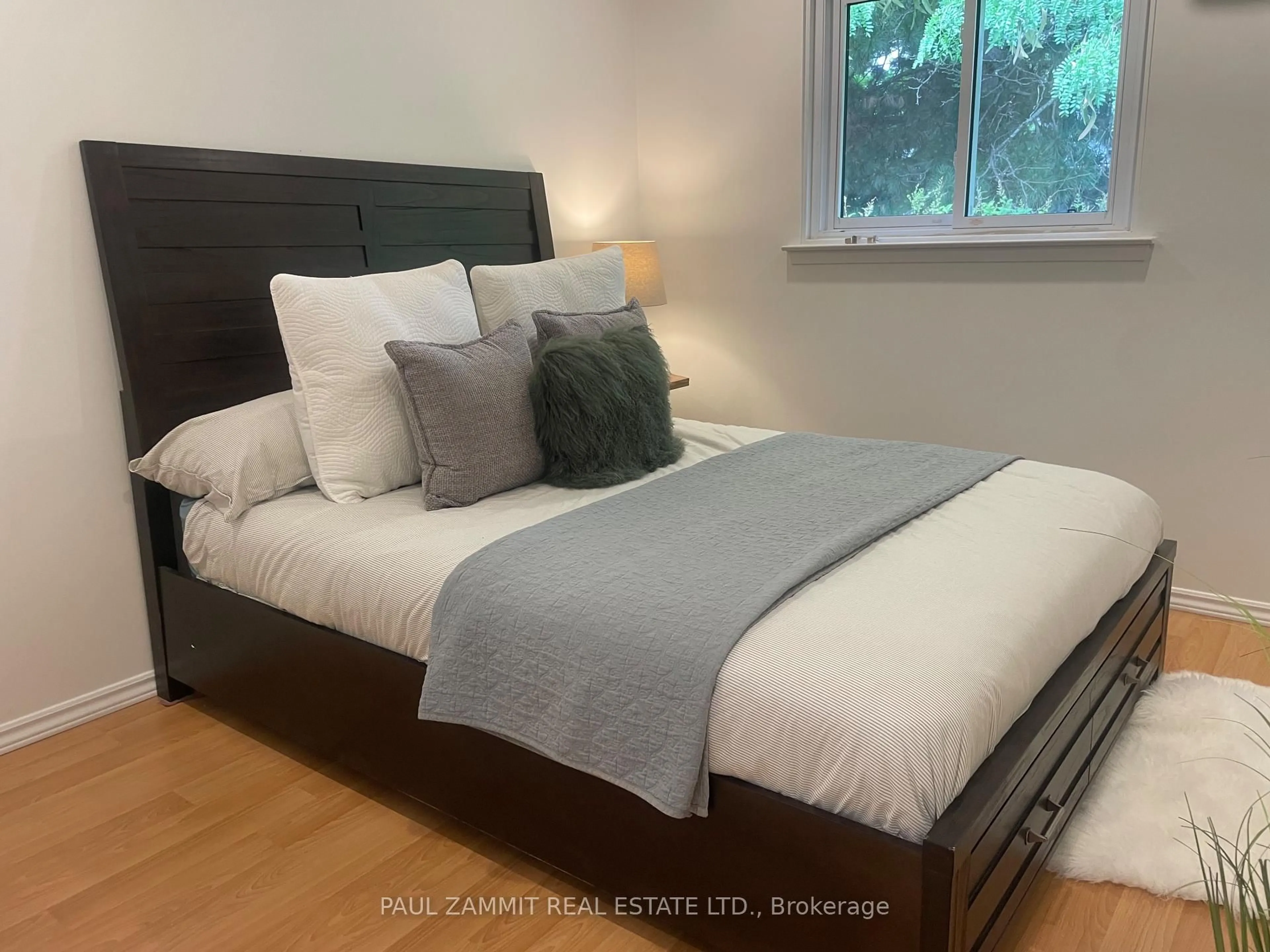 Bedroom with bed, wood/laminate floor for 19 Harris Way, Markham Ontario L3T 5A6