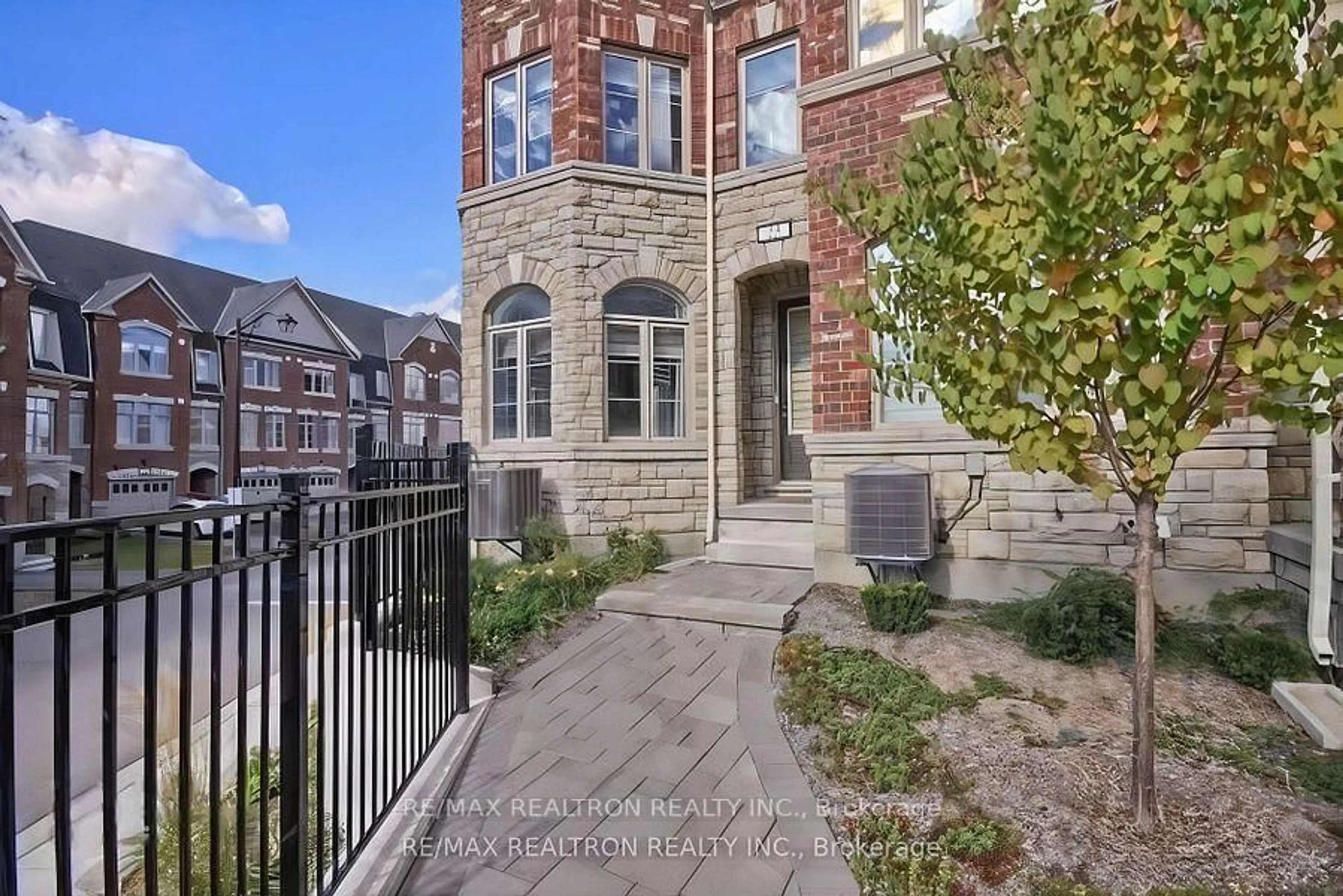 Home with brick exterior material, street for 1331 Major Mackenzie Dr #25, Vaughan Ontario L6A 4W4