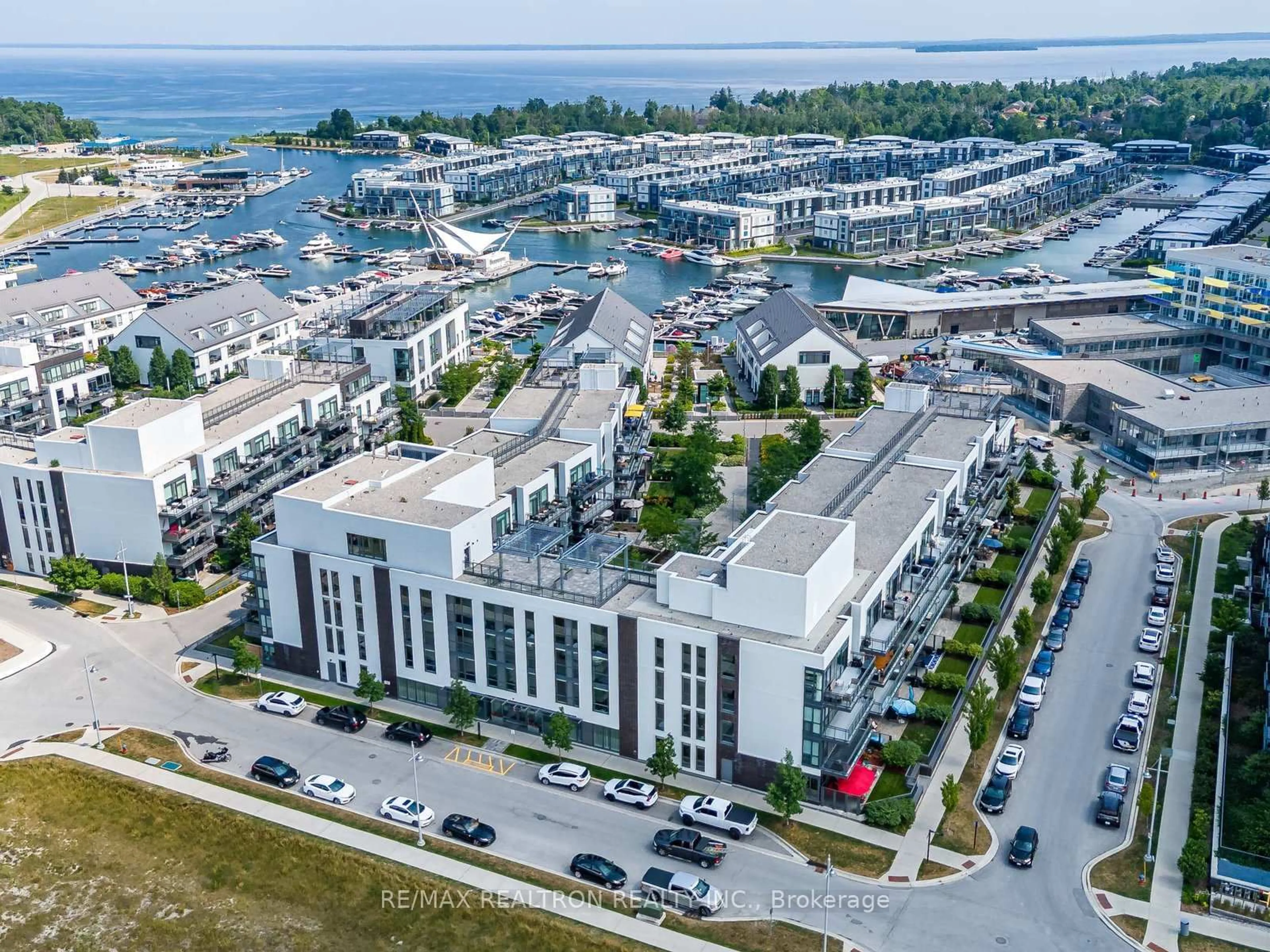 A pic from outside/outdoor area/front of a property/back of a property/a pic from drone, street for 333 Sea Ray Ave #D201, Innisfil Ontario L9S 0M3
