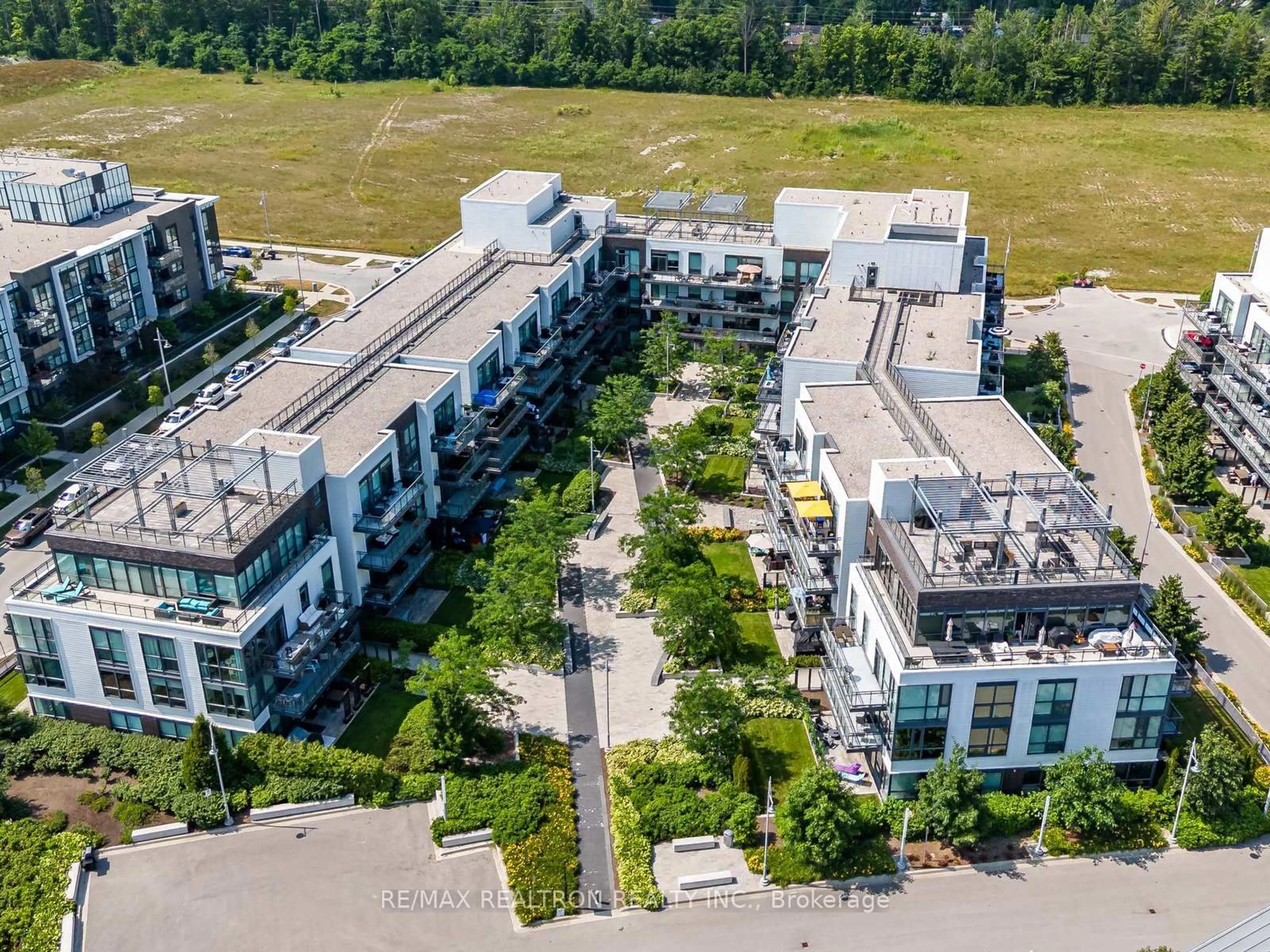 A pic from outside/outdoor area/front of a property/back of a property/a pic from drone, building for 333 Sea Ray Ave #D201, Innisfil Ontario L9S 0M3