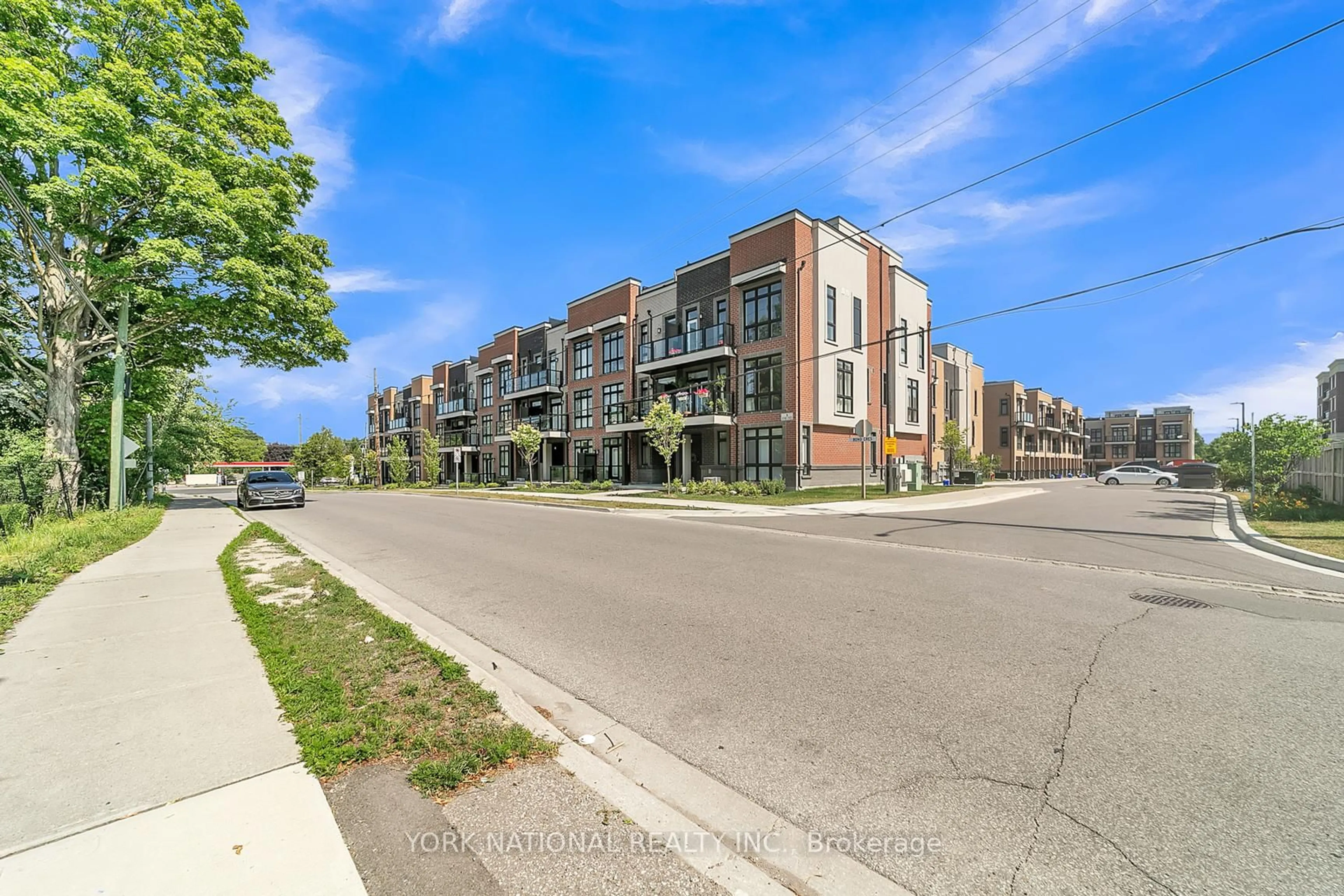 A pic from outside/outdoor area/front of a property/back of a property/a pic from drone, street for 3 Bond Cres #10, Richmond Hill Ontario L4E 1J4