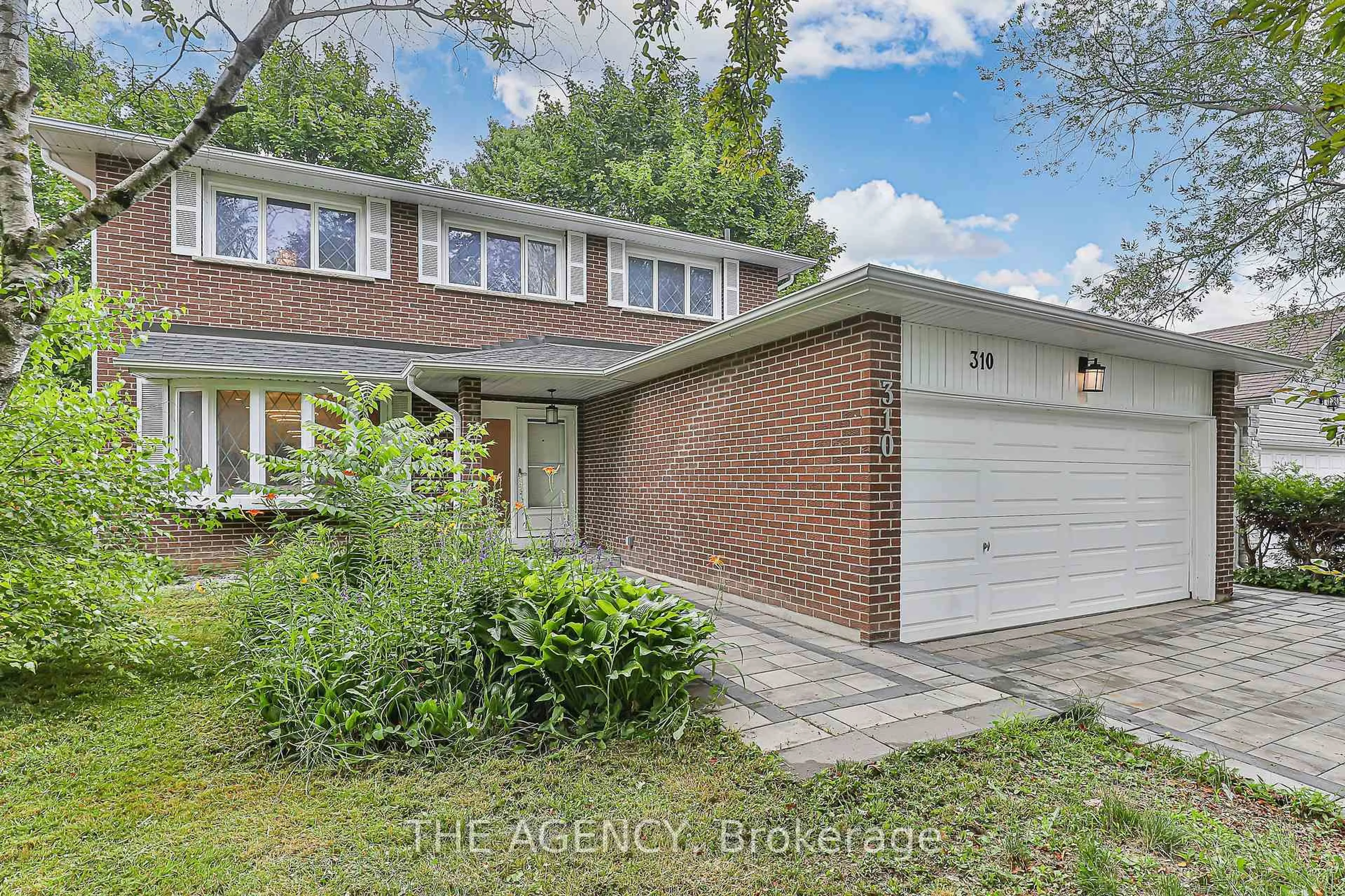 Home with brick exterior material, street for 310 Primrose Lane, Newmarket Ontario L3Y 5Y9
