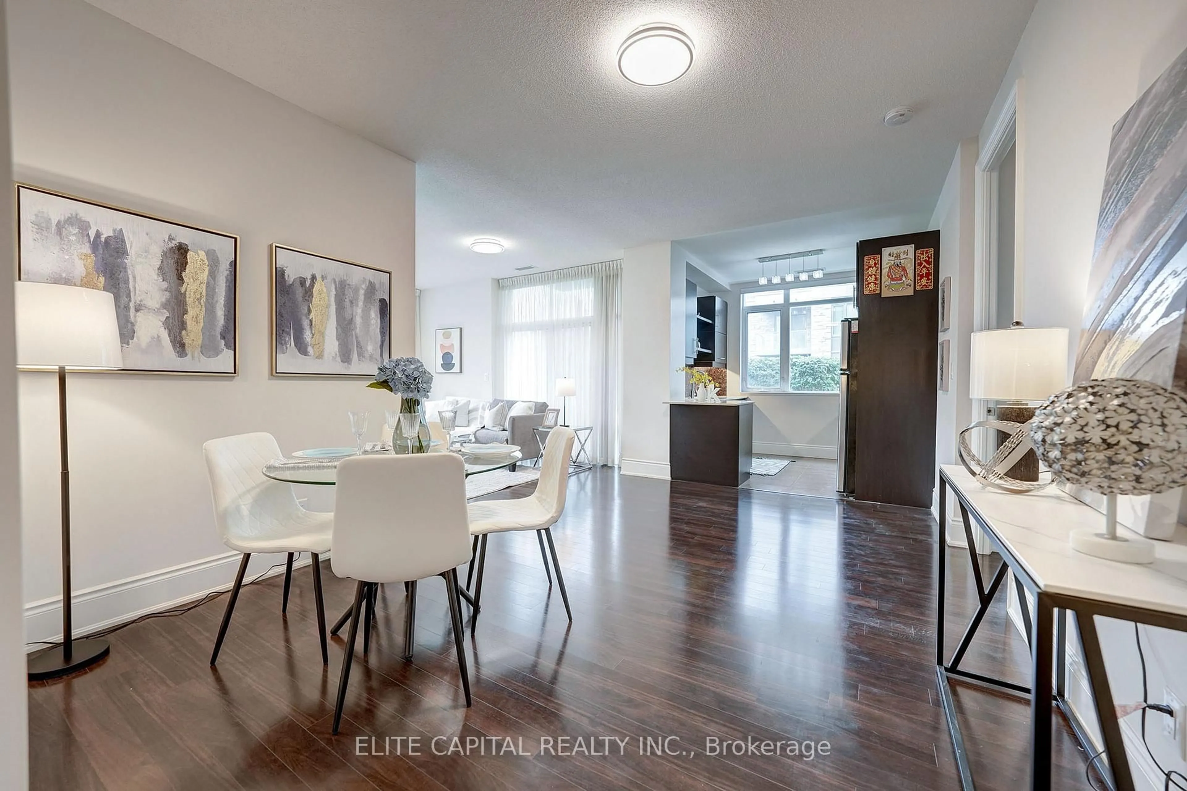 Dining room, wood/laminate floor for 273 South Park Rd #106, Markham Ontario L3T 0B5