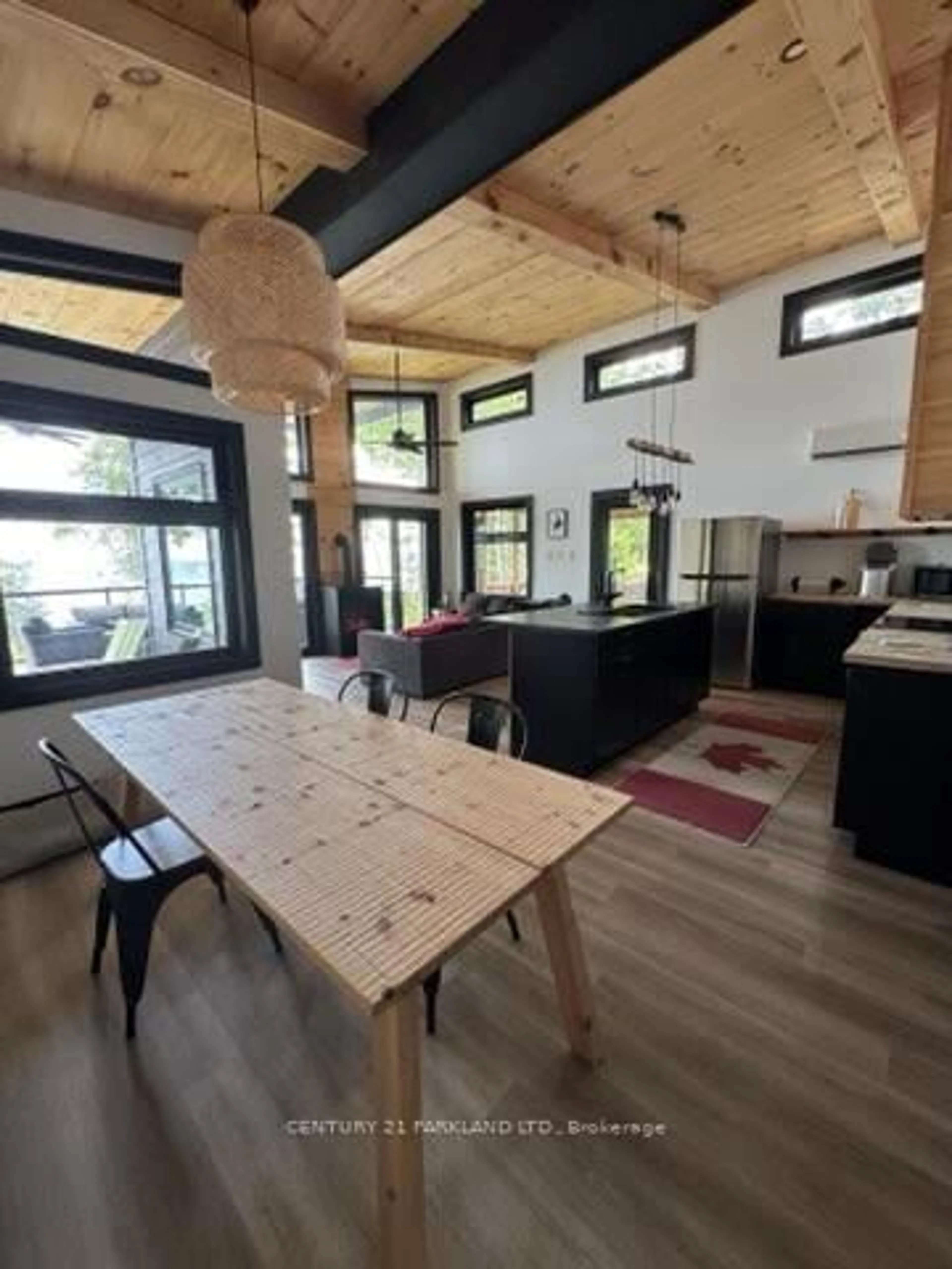 Open concept kitchen, wood/laminate floor for 54 Fox Island Rd, Georgina Islands Ontario L0E 1R2