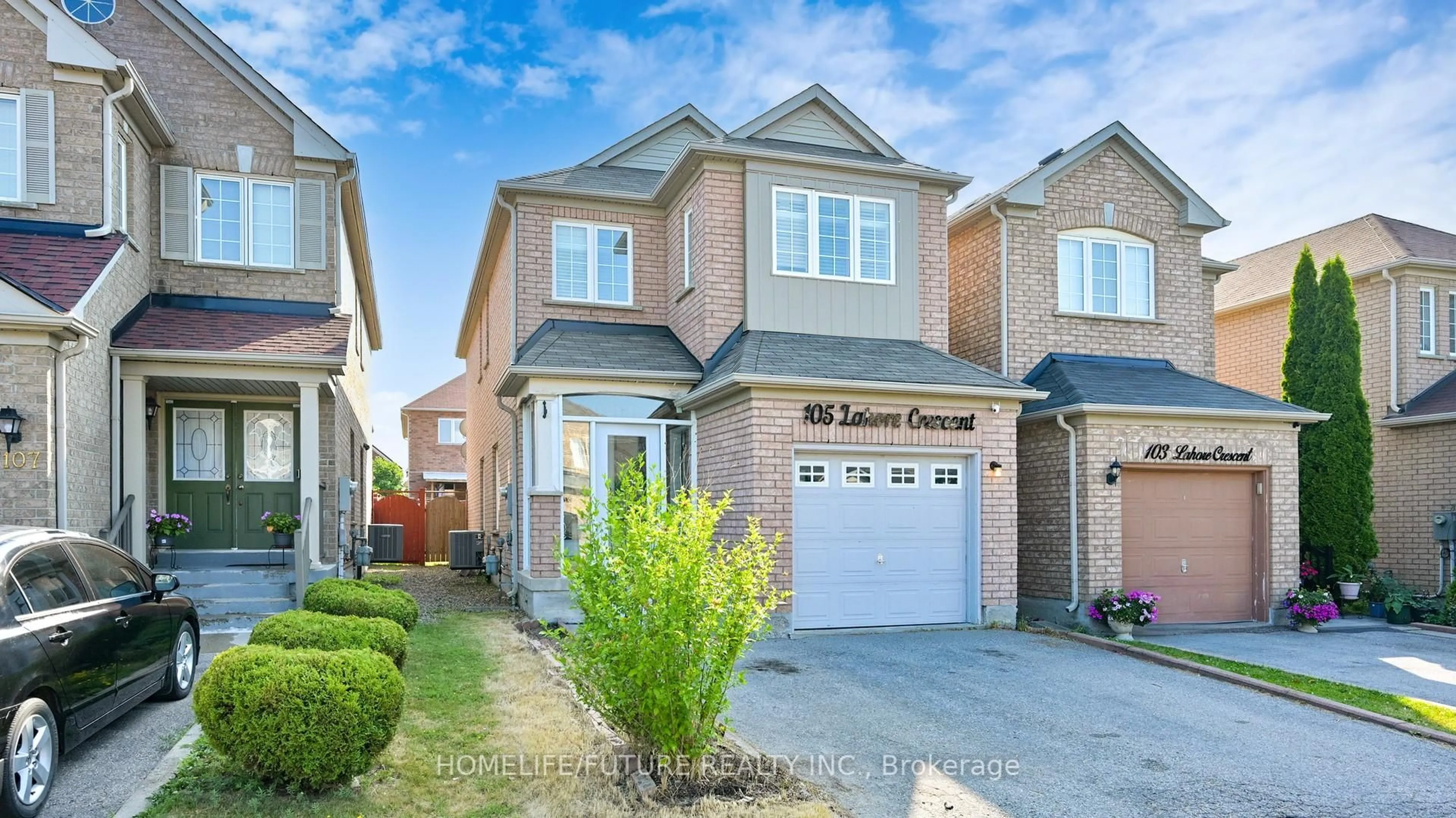 Home with brick exterior material, street for 105 Lahore Cres, Markham Ontario L3S 0A7