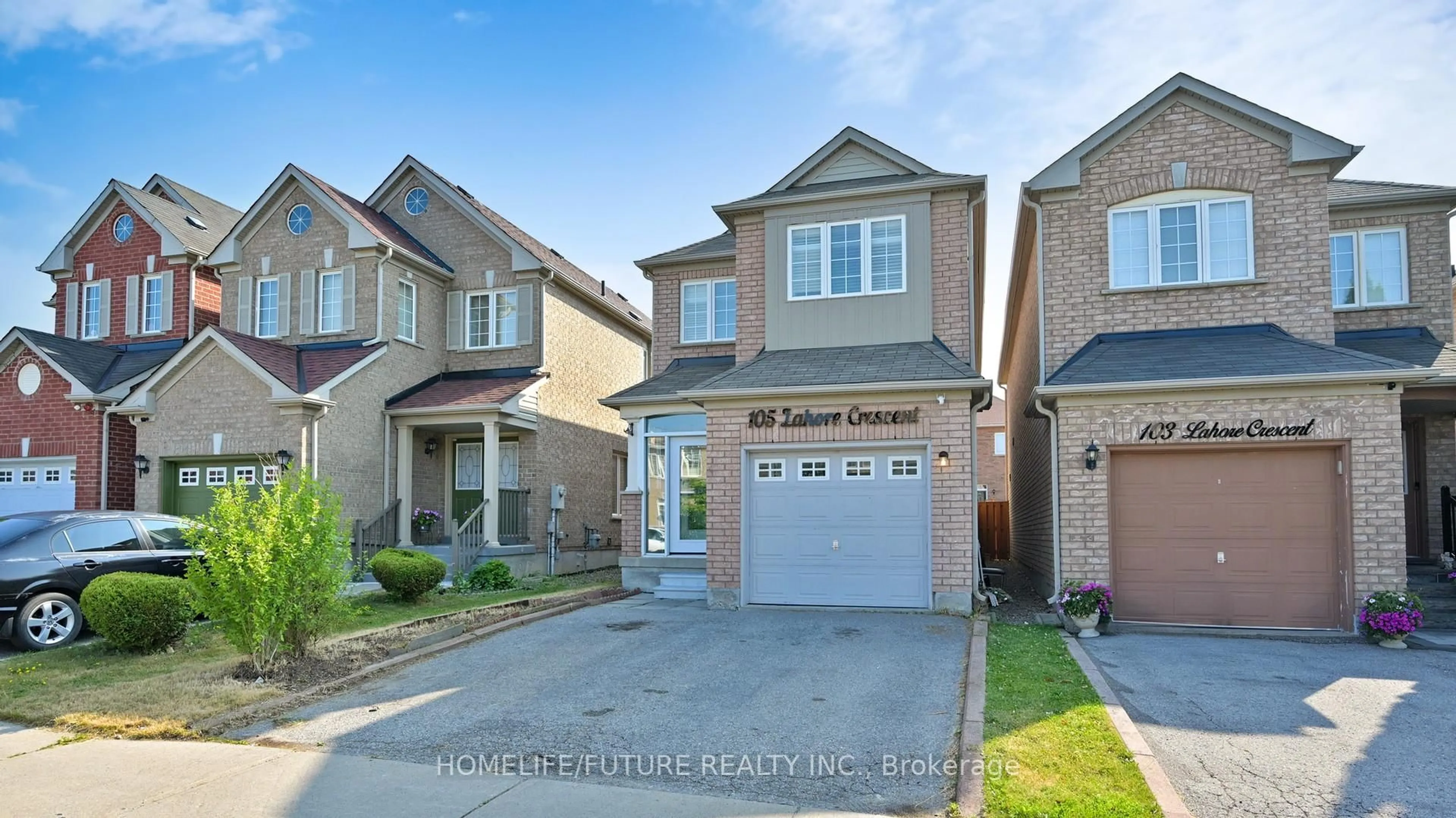 Home with brick exterior material, street for 105 Lahore Cres, Markham Ontario L3S 0A7