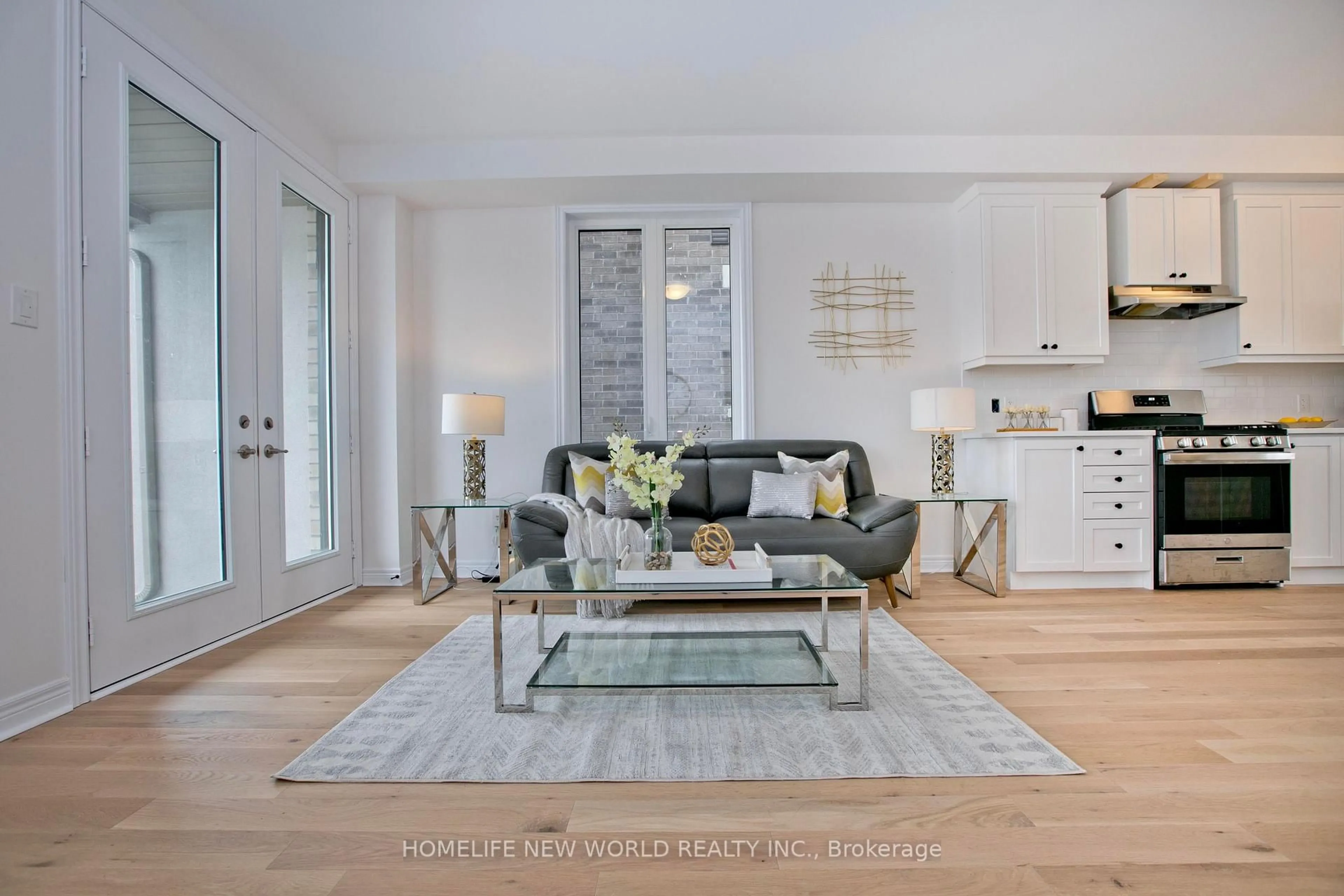 Living room with furniture, wood/laminate floor for 83 Mumbai Dr, Markham Ontario L3S 0G3