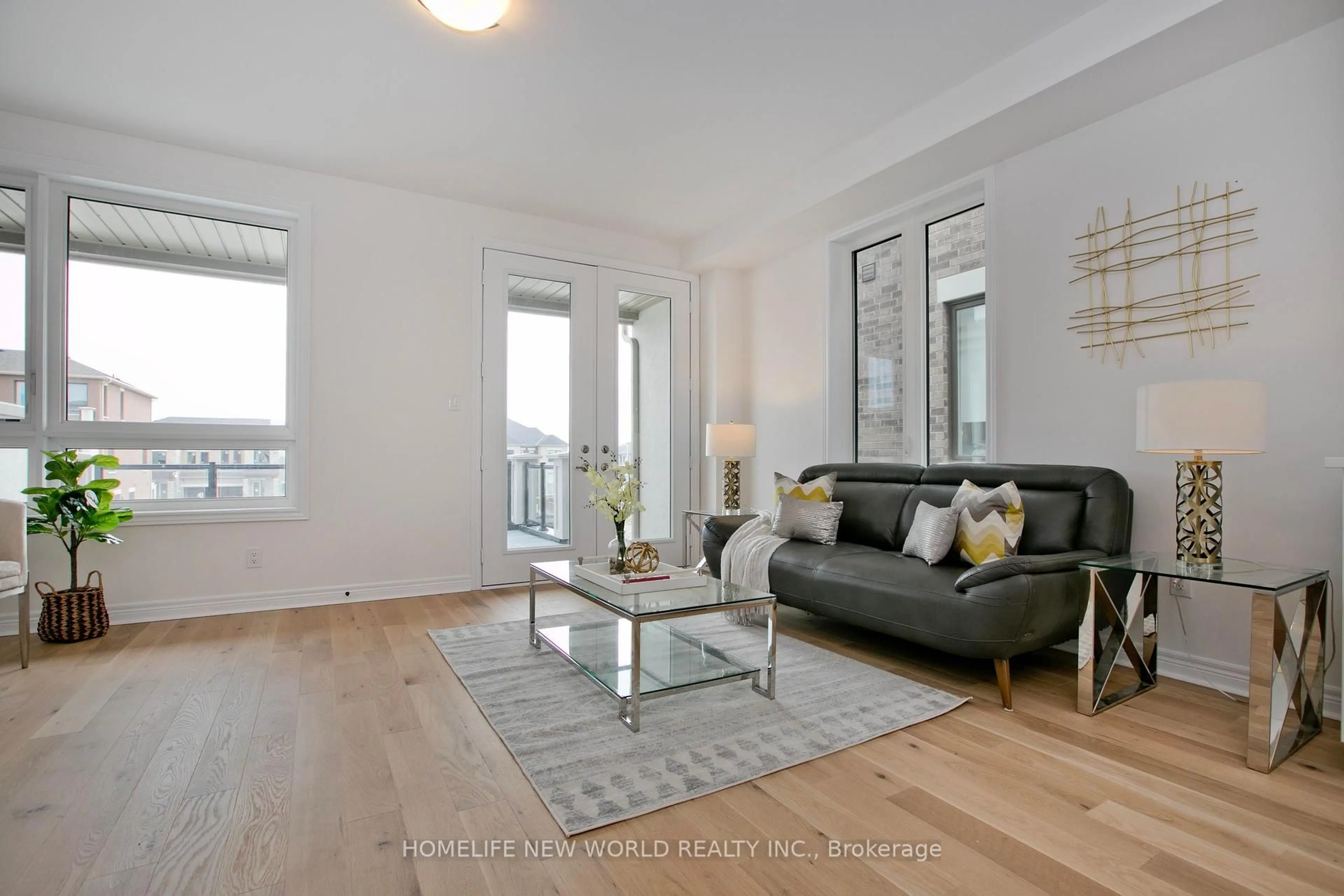 Living room with furniture, wood/laminate floor for 83 Mumbai Dr, Markham Ontario L3S 0G3